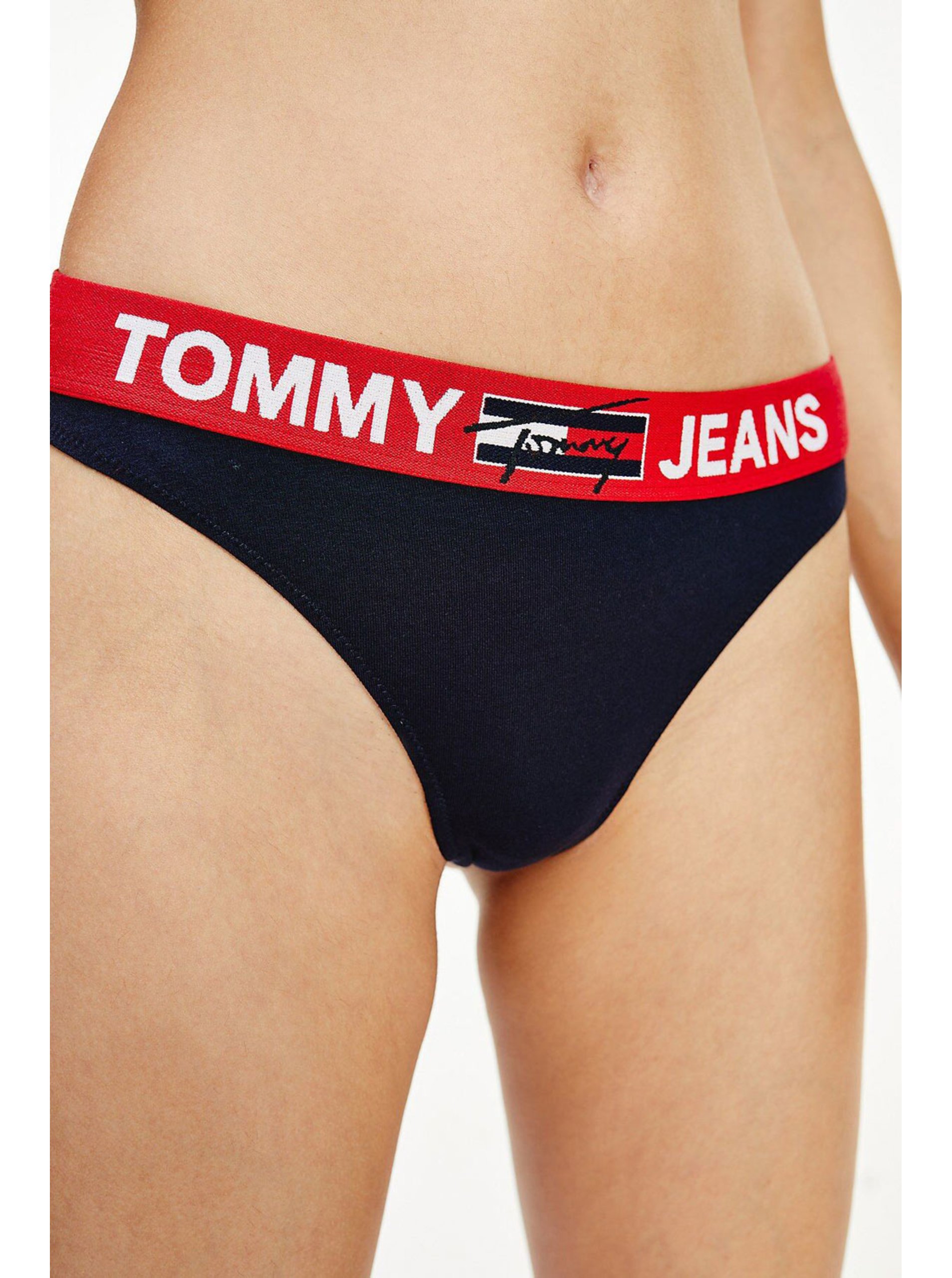 Lacno Tommy Hilfiger tmavomodré dámske tangá Thong s červenou gumou