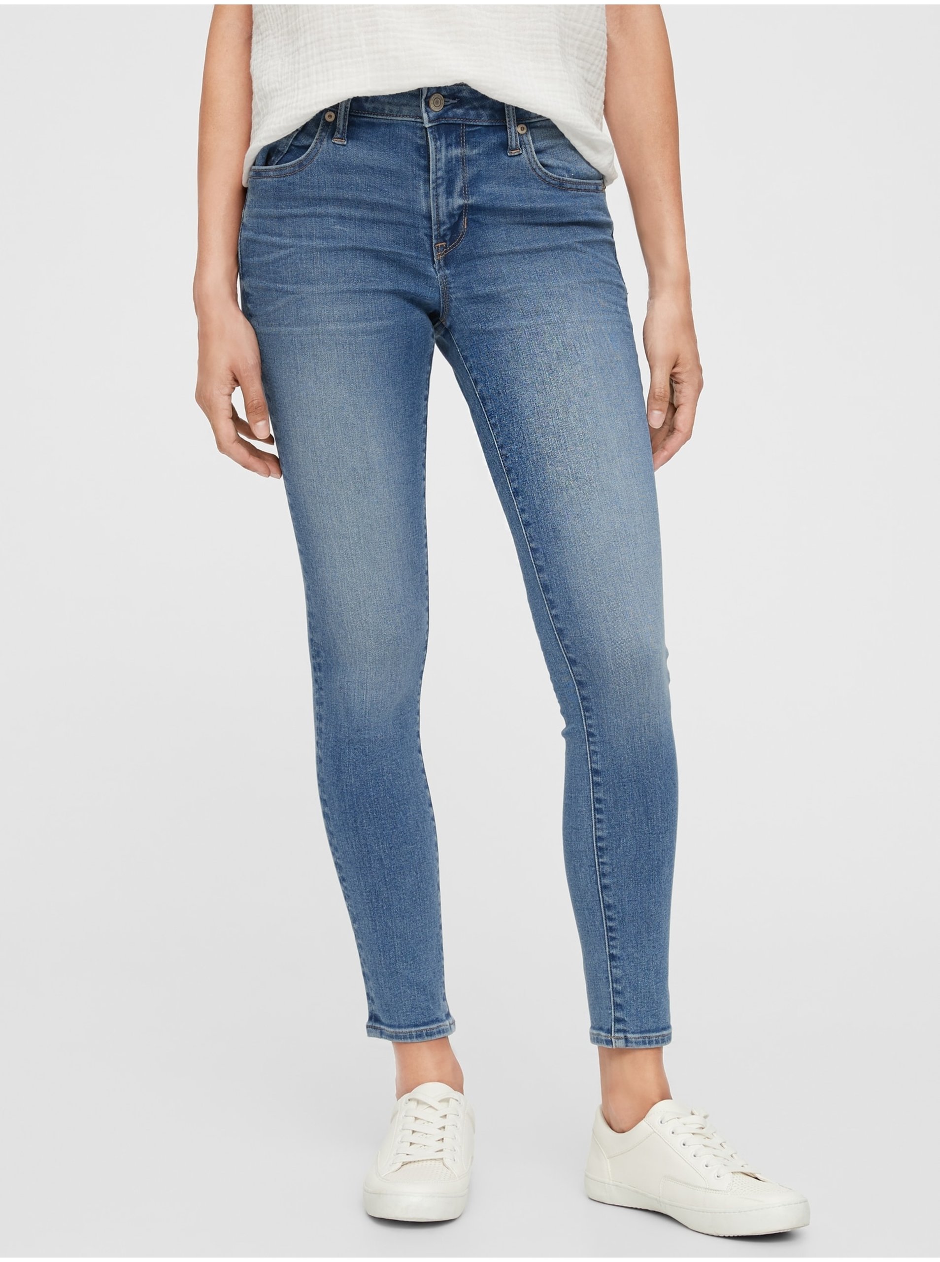 Lacno Modré dámské džíny mid rise universal legging jeans