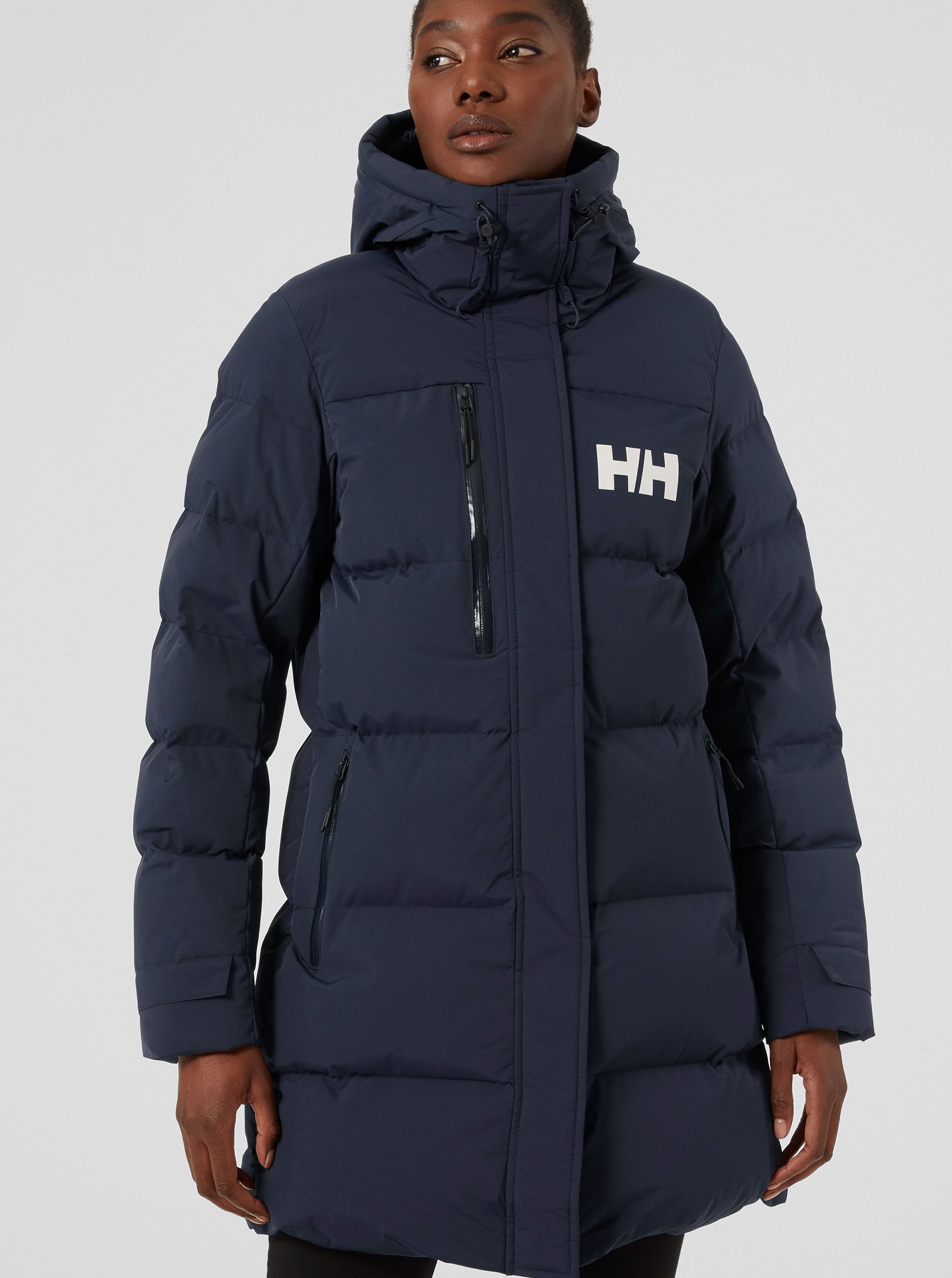 Levně Tmavě modrý dámský zimní prošívaný kabát HELLY HANSEN