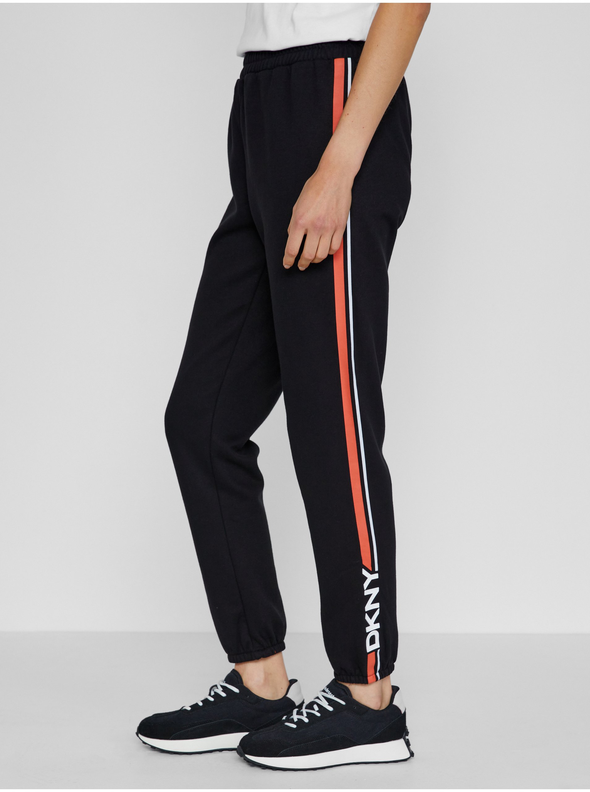 Levně Černé dámské straight fit kalhoty s pruhy DKNY