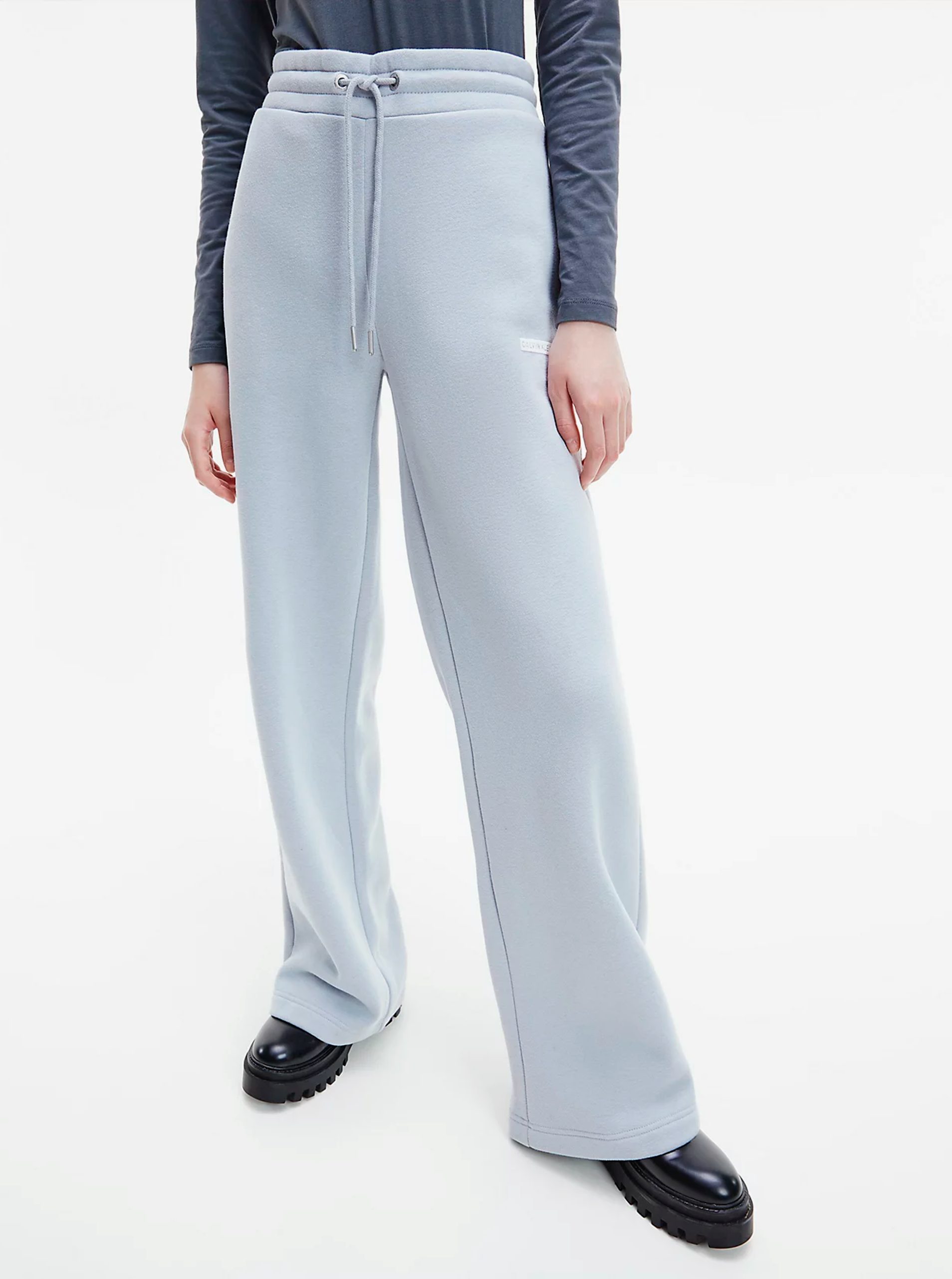 Levně Světle modré dámské volné tepláky Micro Flock Jog Pants Calvin Klein Jeans