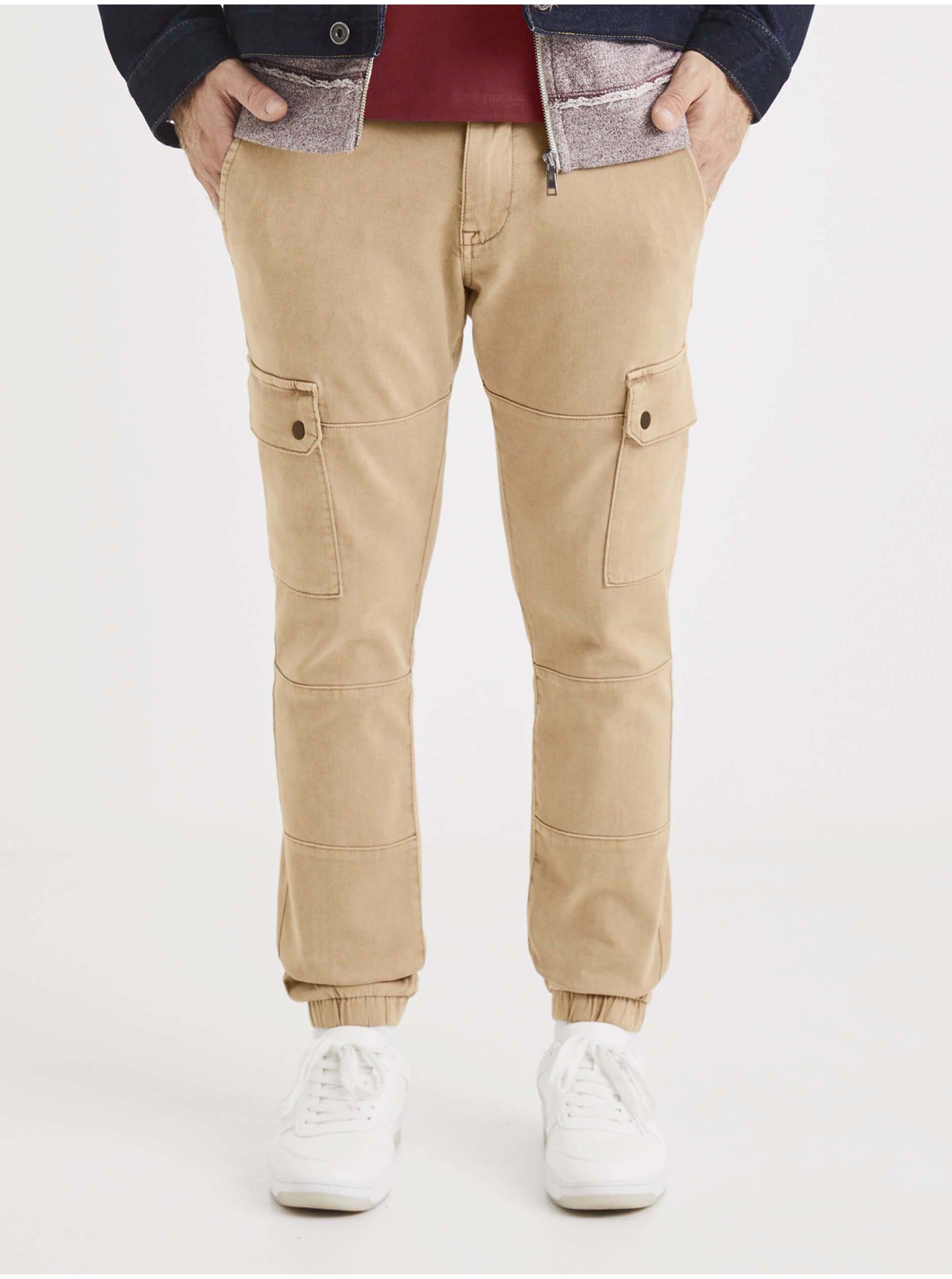 Levně Béžové kalhoty Celio Solyte