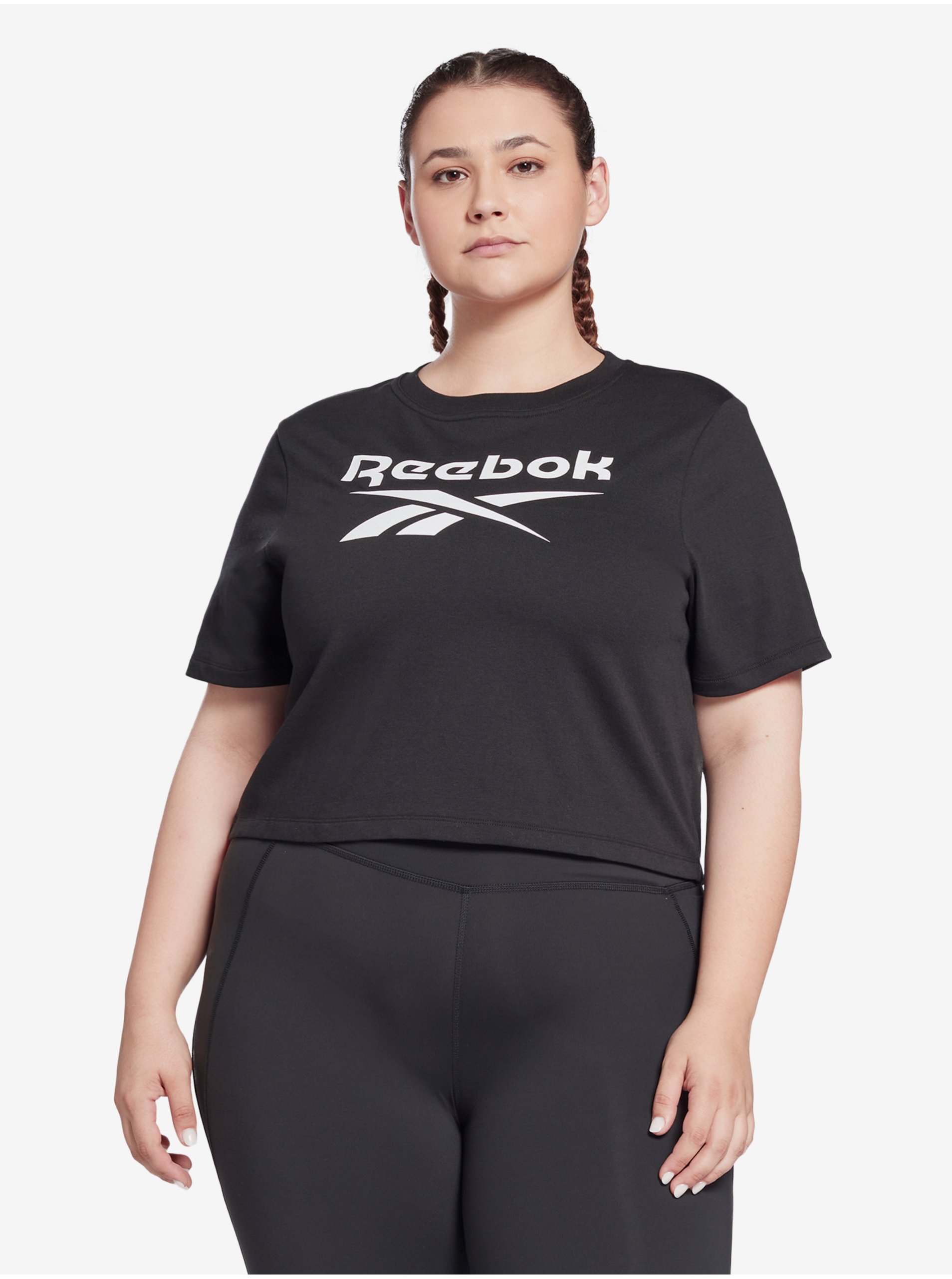Levně Černé dámské sportovní tričko Reebok