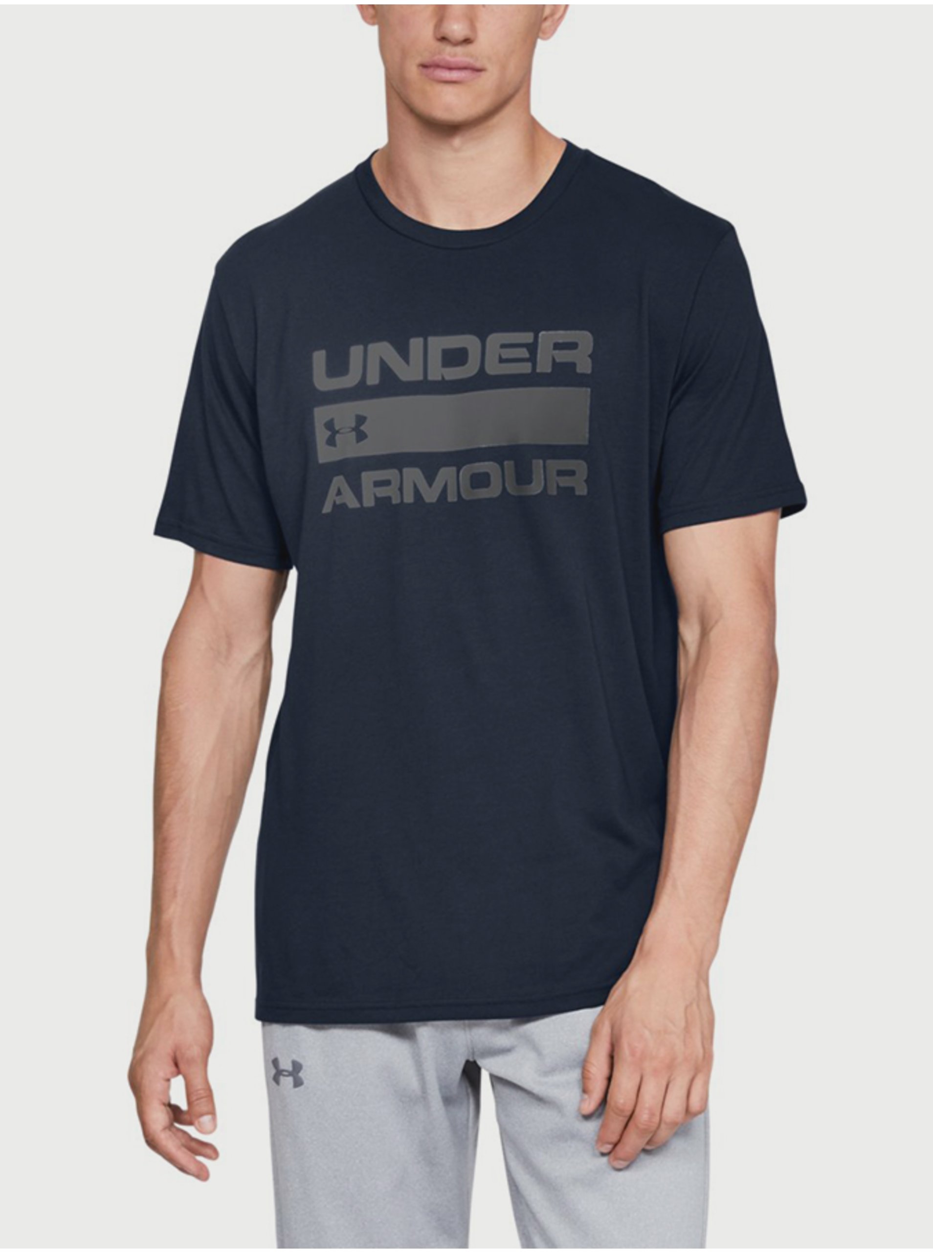 Levně Tmavě modré pánské tričko Under Armour Team Issue
