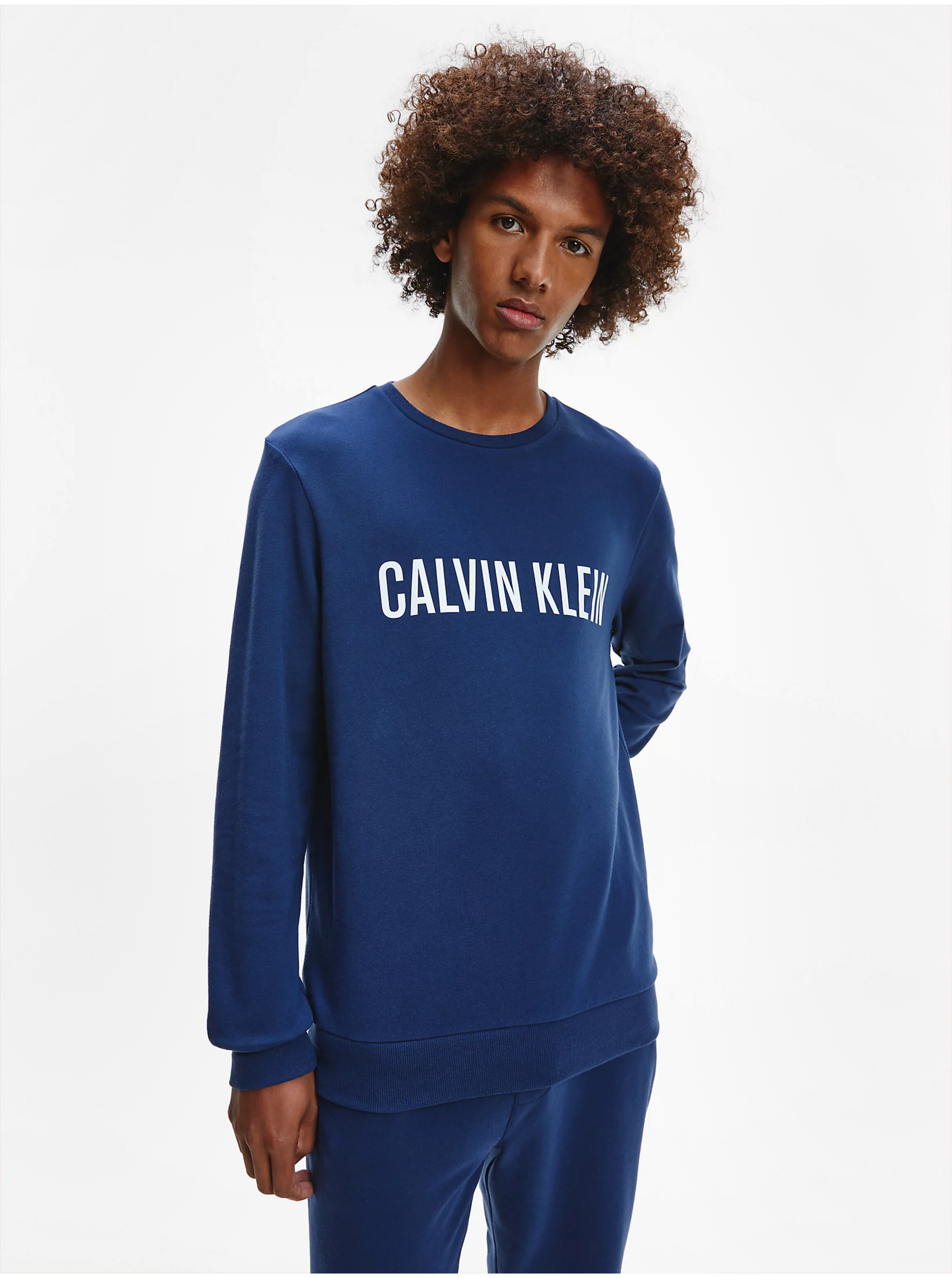 Levně Tmavě modrá pánská mikina Calvin Klein Jeans