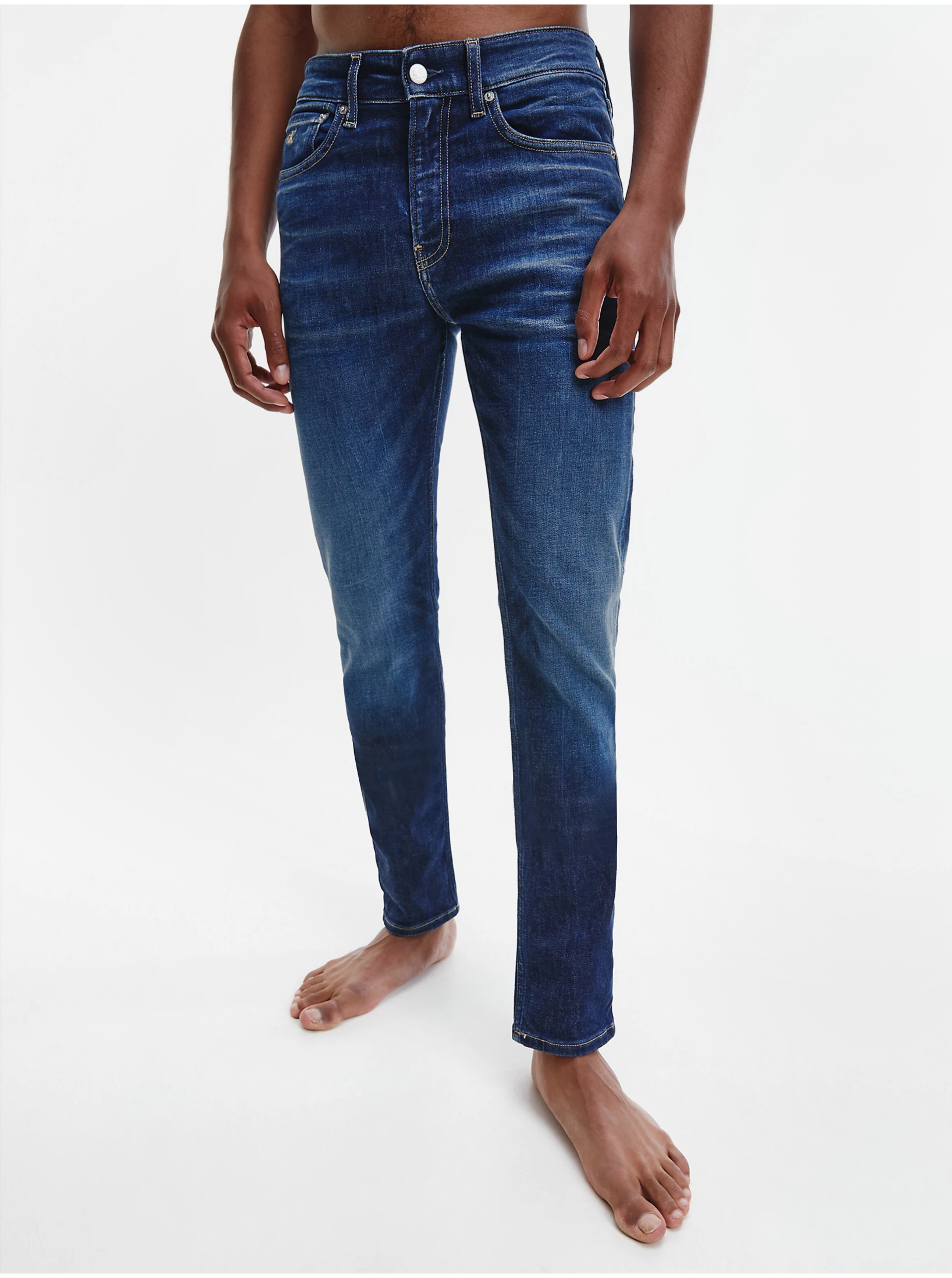 Levně Tmavě modré pánské skinny fit džíny s vyšisovaným efektem Calvin Klein Jeans