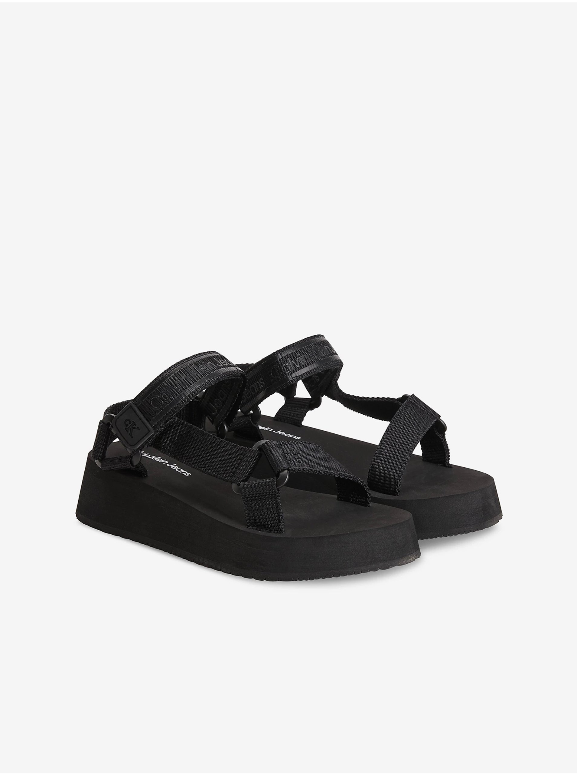 Levně Černé dámské sandále na platformě Calvin Klein Jeans