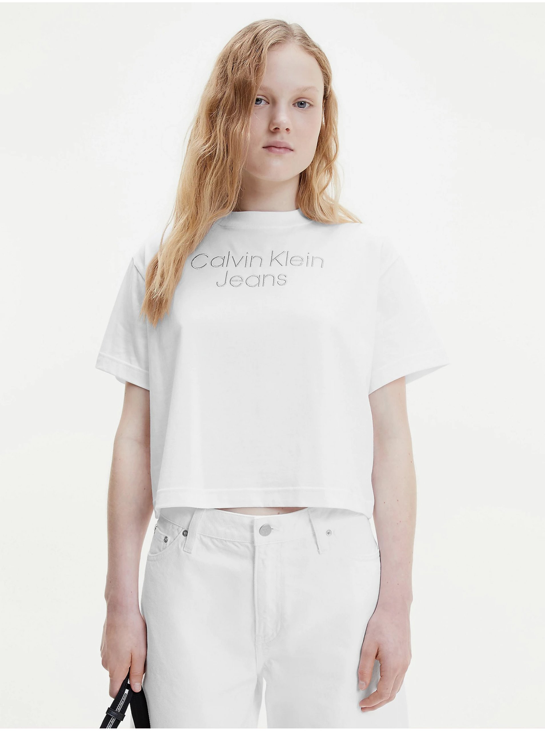 Levně Bílé dámské tričko Calvin Klein Jeans