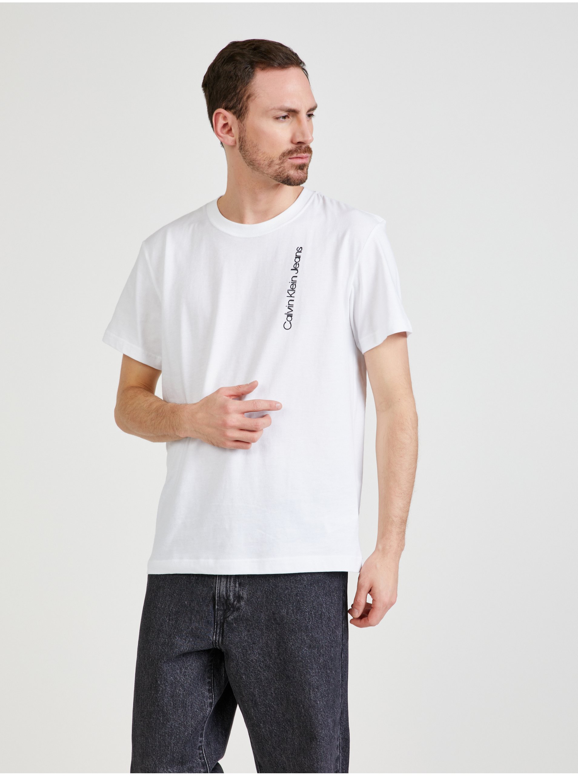 Levně Bílé pánské vzorované tričko Calvin Klein Jeans