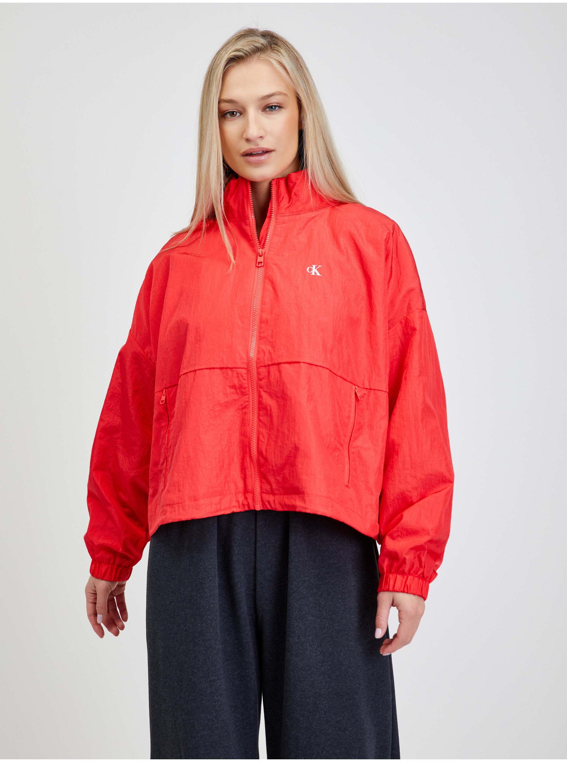 Levně Červená dámská volná bunda s potiskem Calvin Klein Jeans