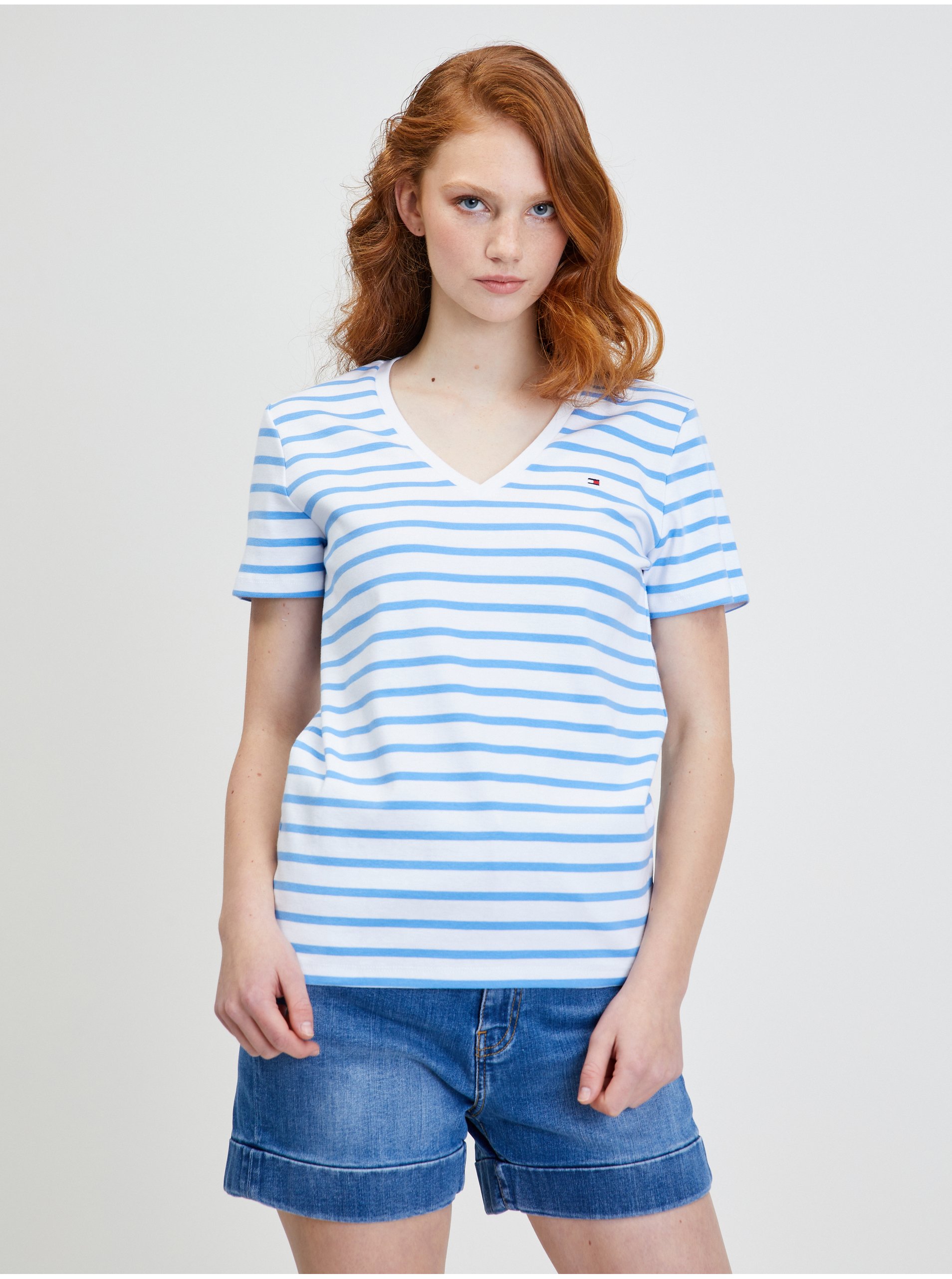 Levně Modro-bílé dámské pruhované tričko Tommy Hilfiger