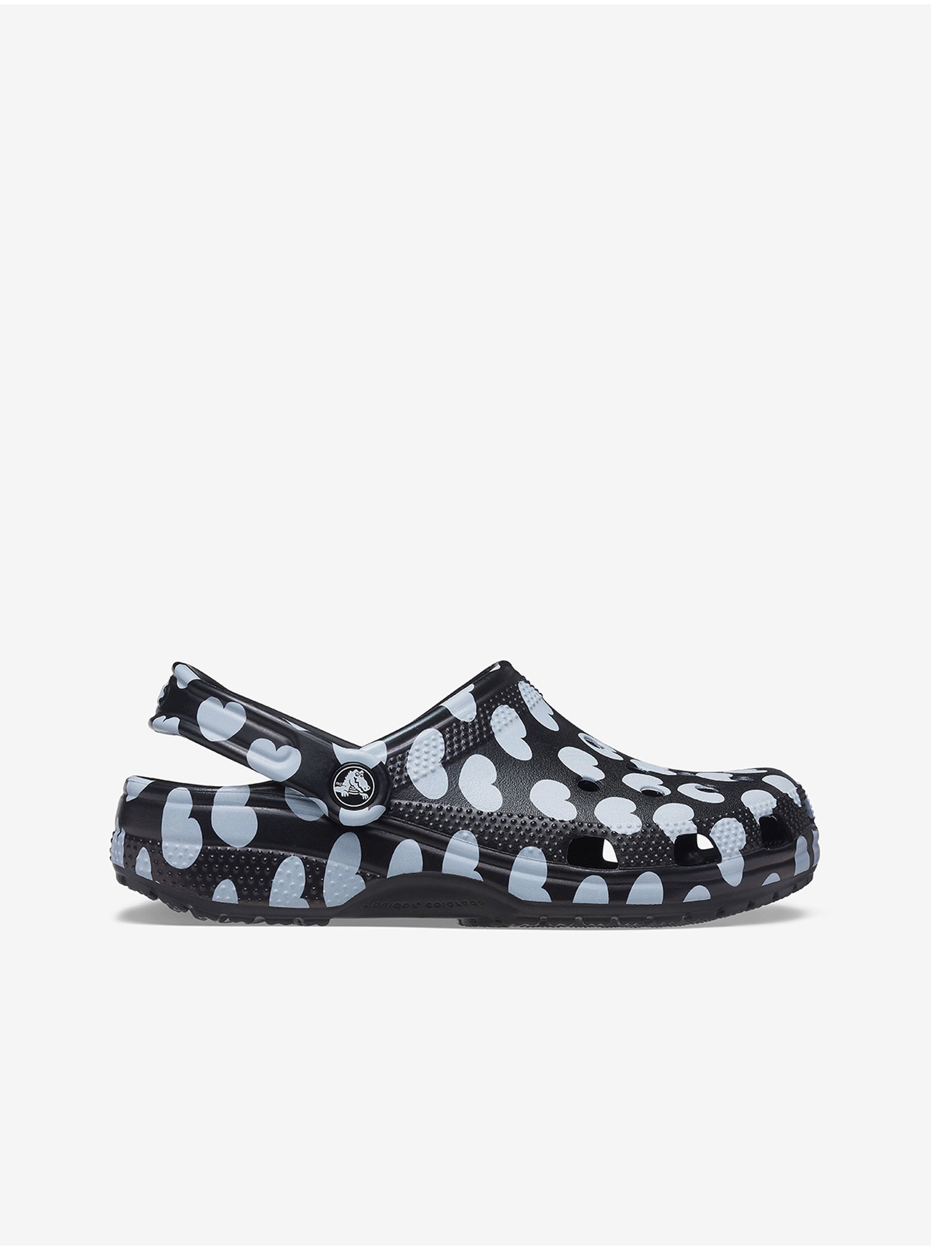 Levně Bílo-černé dámské vzorované pantofle Crocs Classic Heart Print Clog