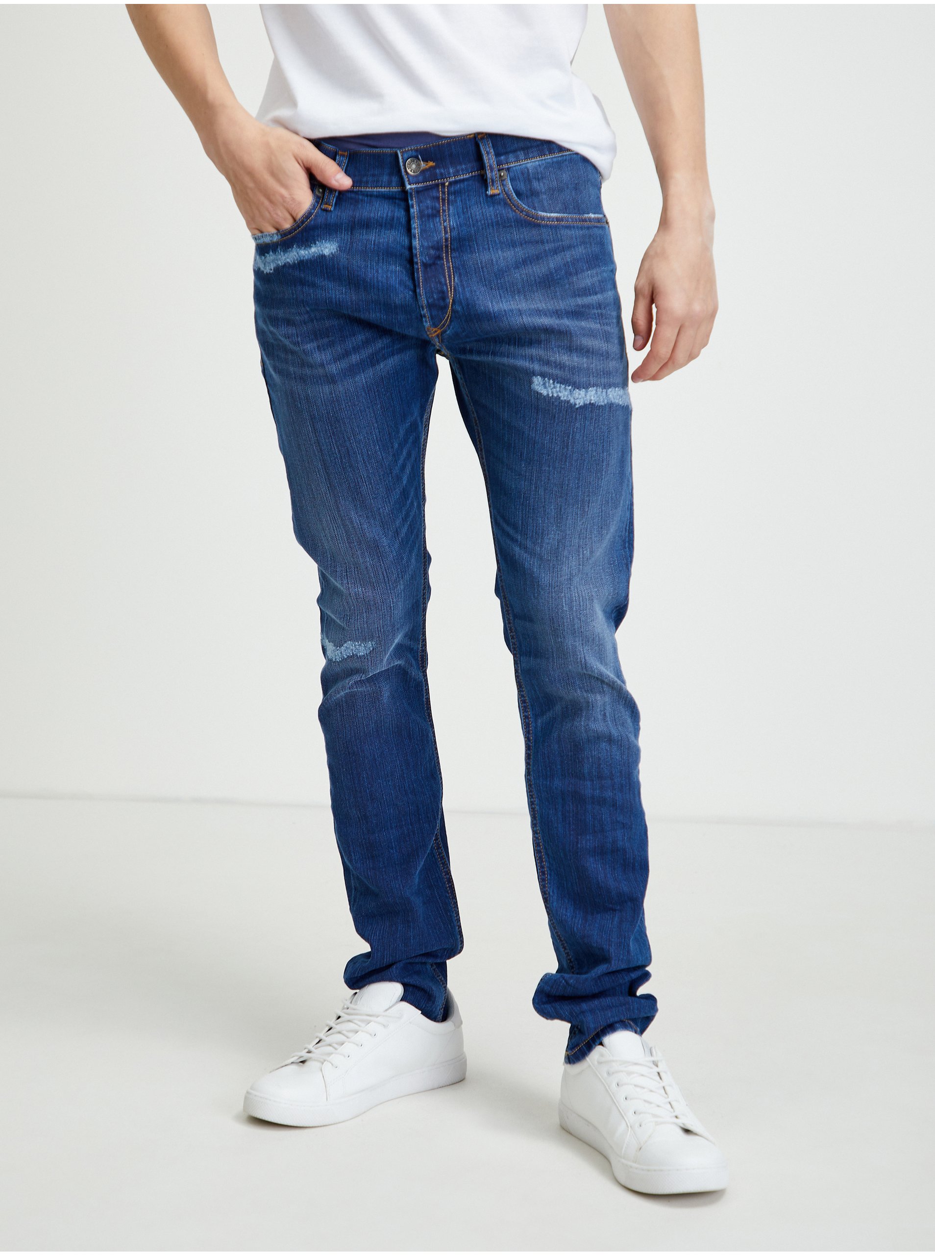 Levně Modré pánské skinny fit džíny s potrhaným efektem Diesel Tepphar