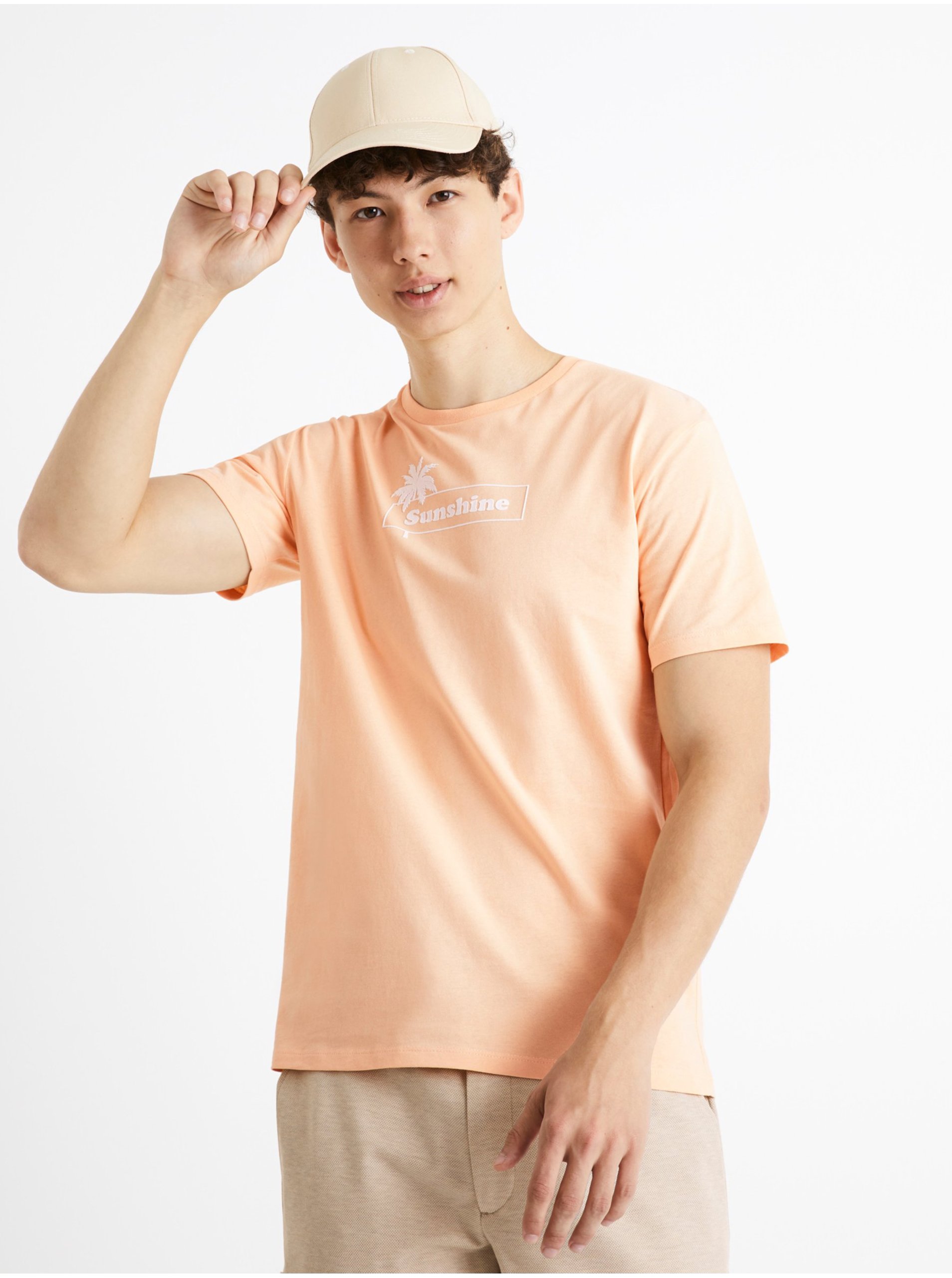 Levně Světle oranžové bavlněné tričko Celio Cecarto Sunshine