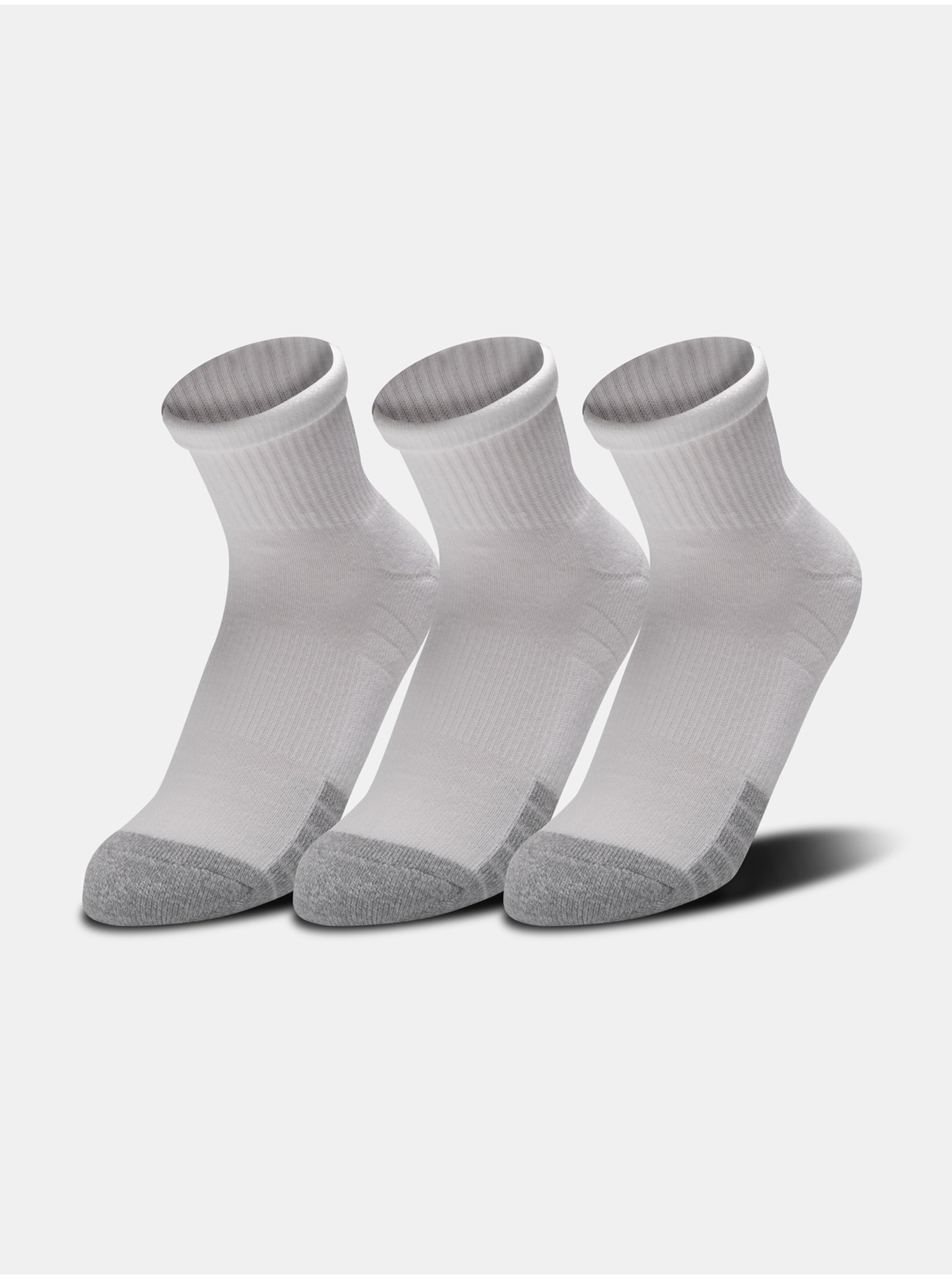 Levně Sada tří párů sportovních ponožek v bílé barvě Under Armour Heatgear.