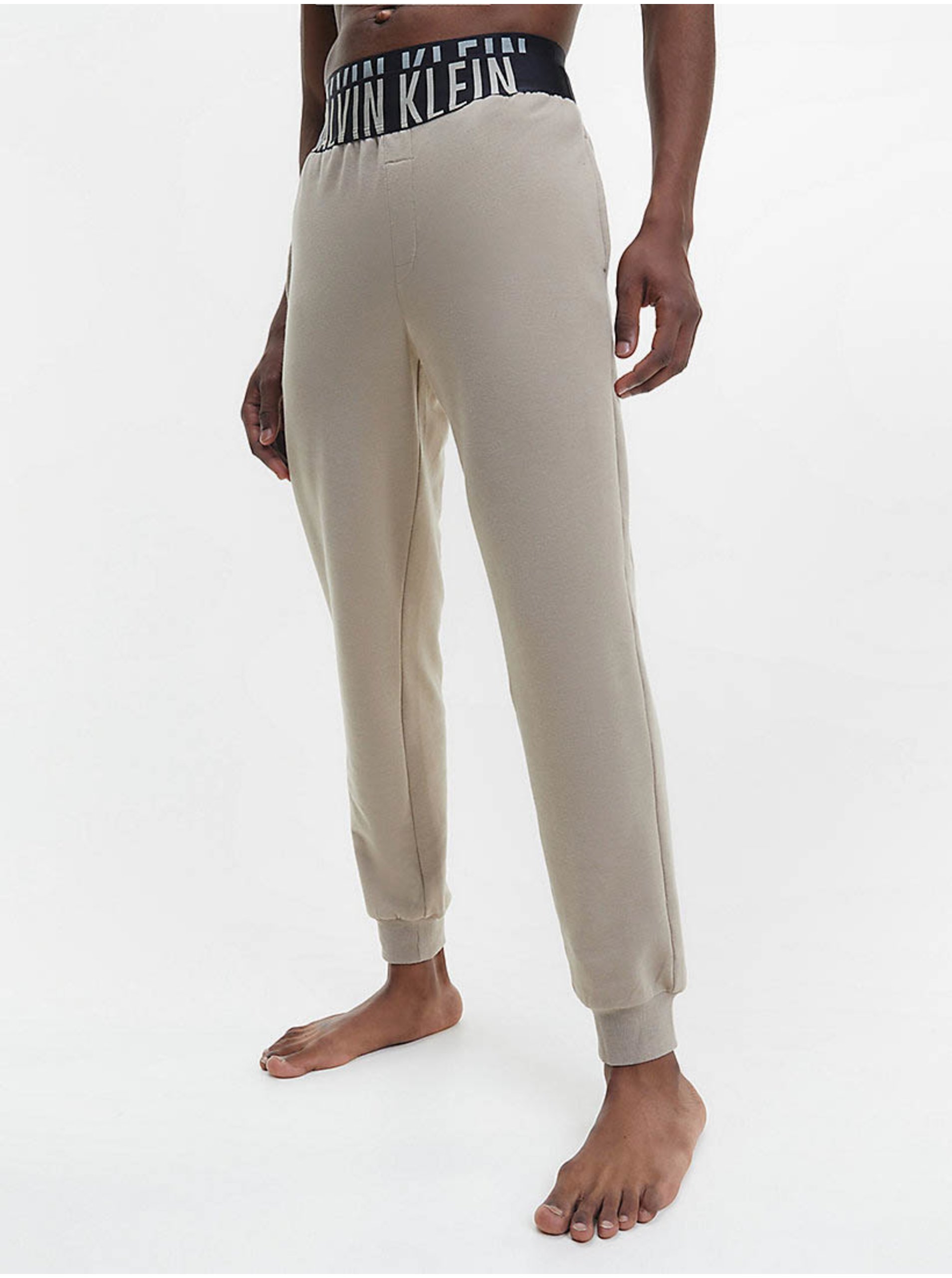 Levně Béžové pánské pyžamové kalhoty Calvin Klein Underwear
