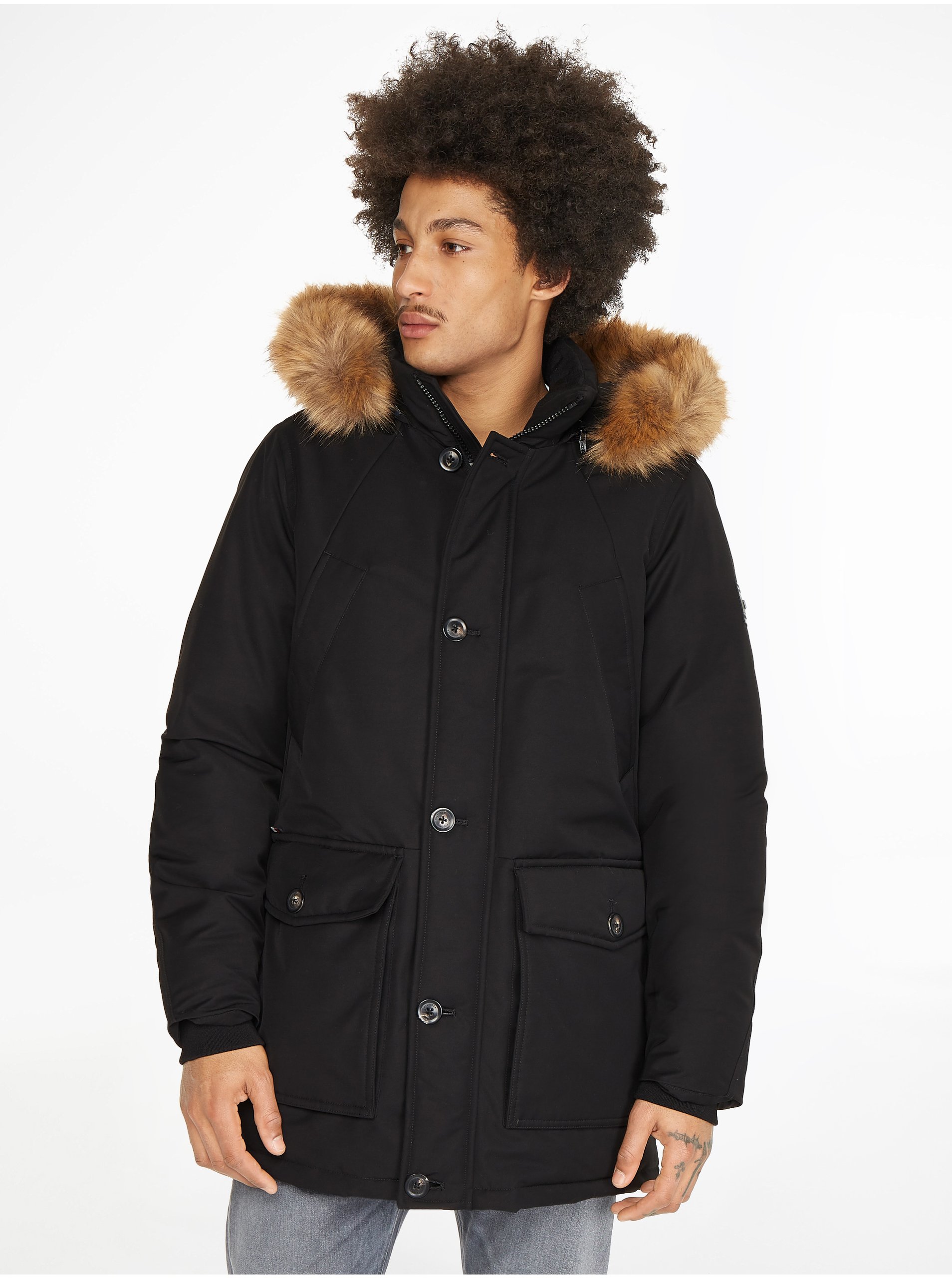 Levně Černá pánská zimní bunda s odepínací kapucí a umělým kožíškem Tommy Hilfiger