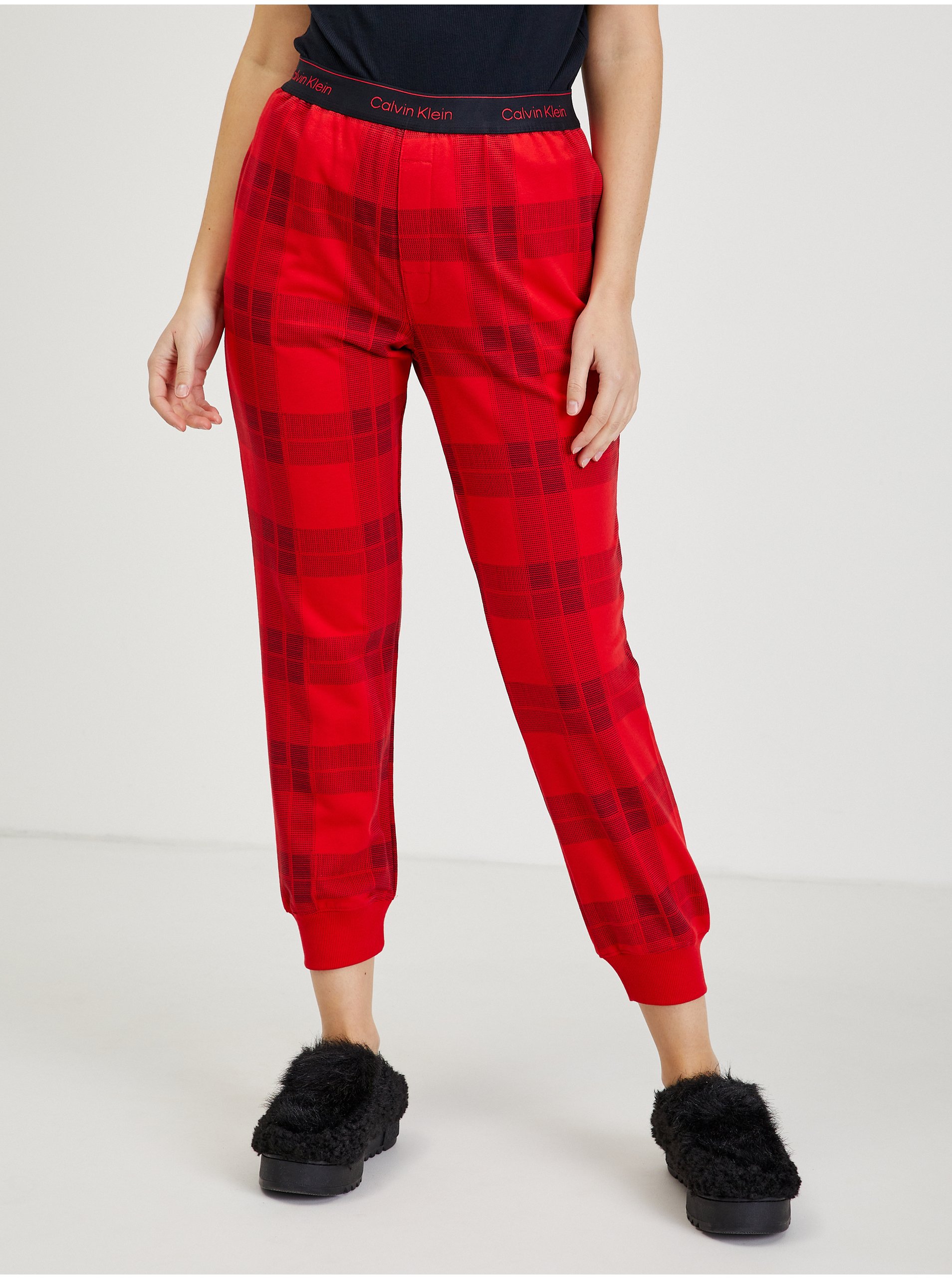 Levně Červené dámské kostkované tepláky Calvin Klein Jeans