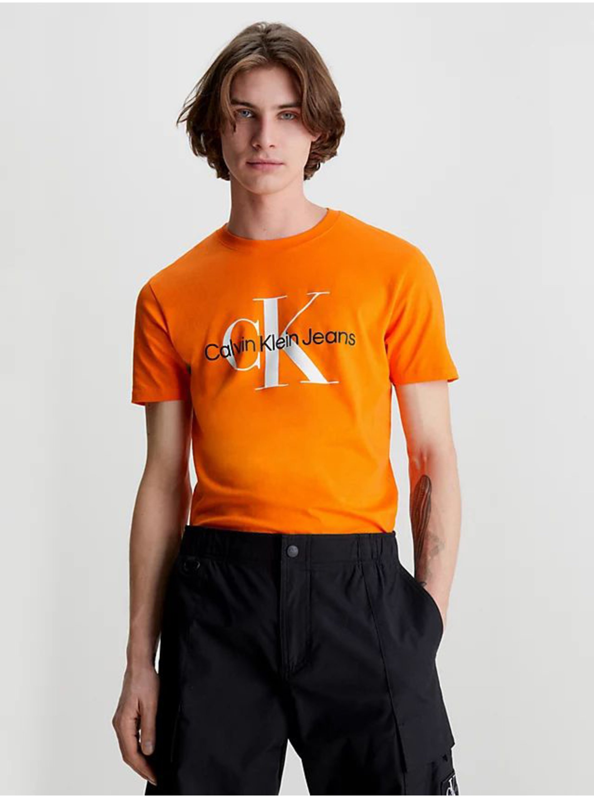 Lacno Oranžové pánske tričko Calvin Klein Jeans