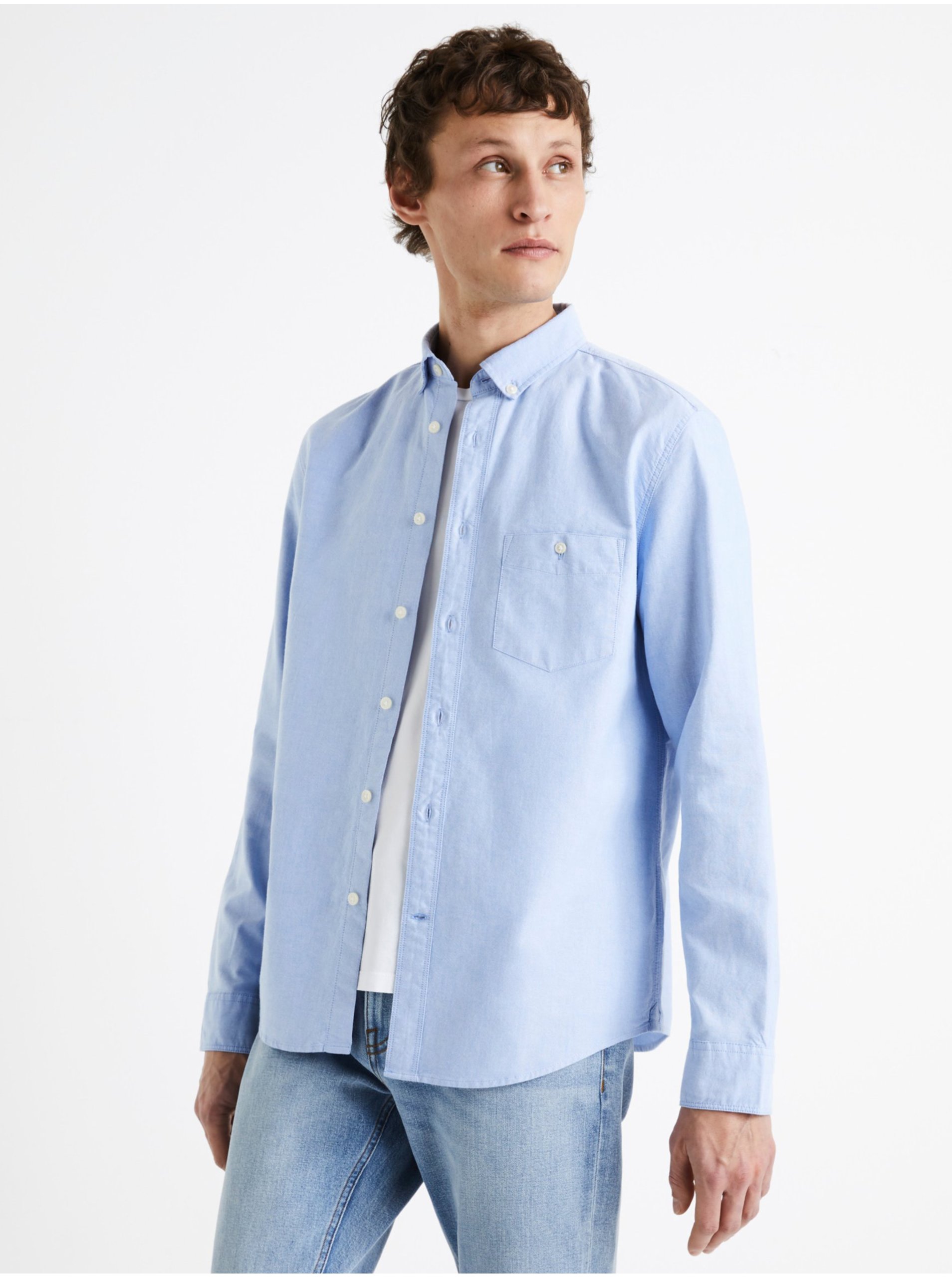 Levně Světle modrá pánská bavlněná košile Celio Daxford