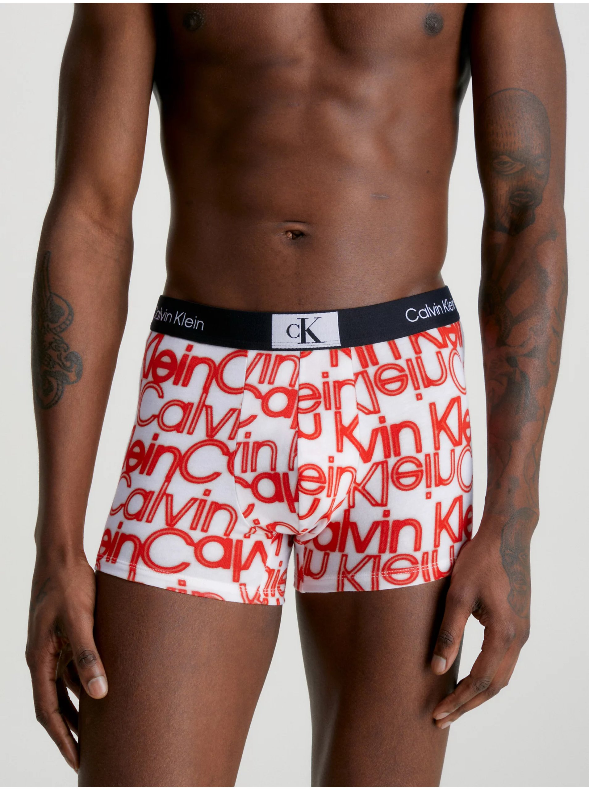 E-shop Oranžovo-krémové pánské vzorované boxerky Calvin Klein Underwear