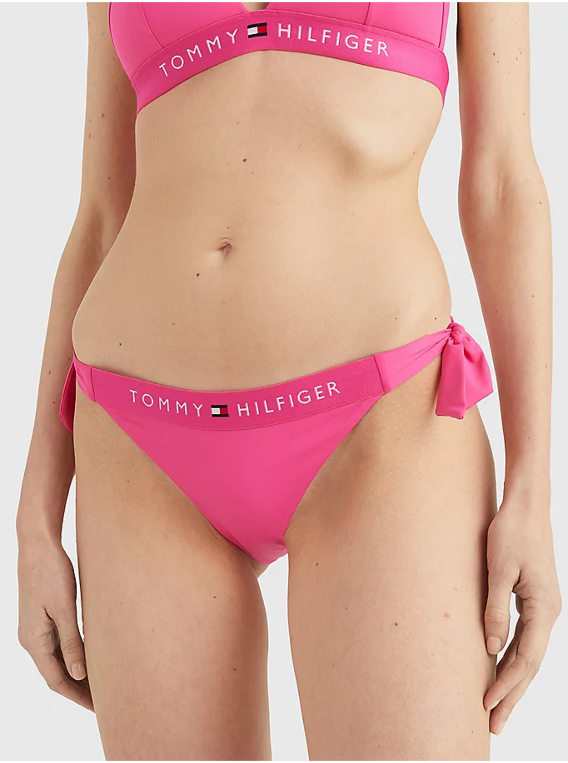 Levně Tmavě růžový dámský spodní díl plavek Tommy Hilfiger Underwear