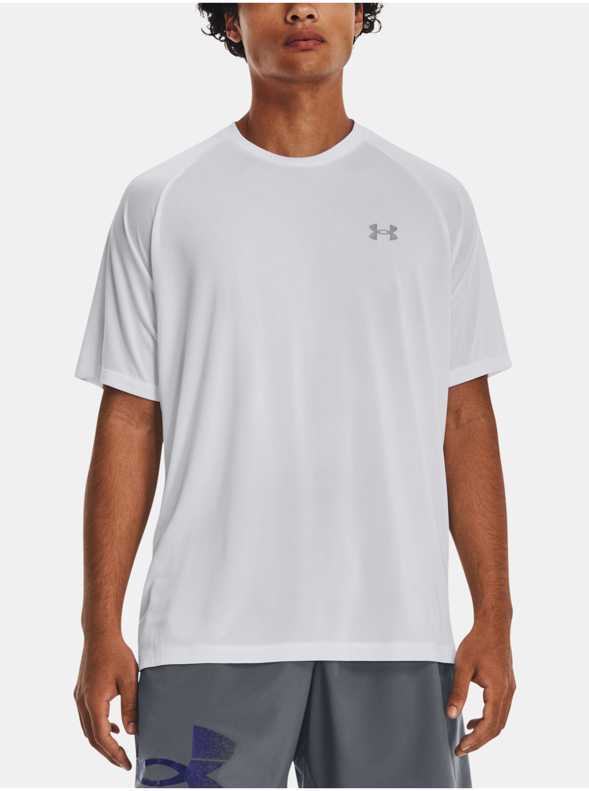 Levně Bílé sportovní tričko Under Armour UA Tech Reflective SS