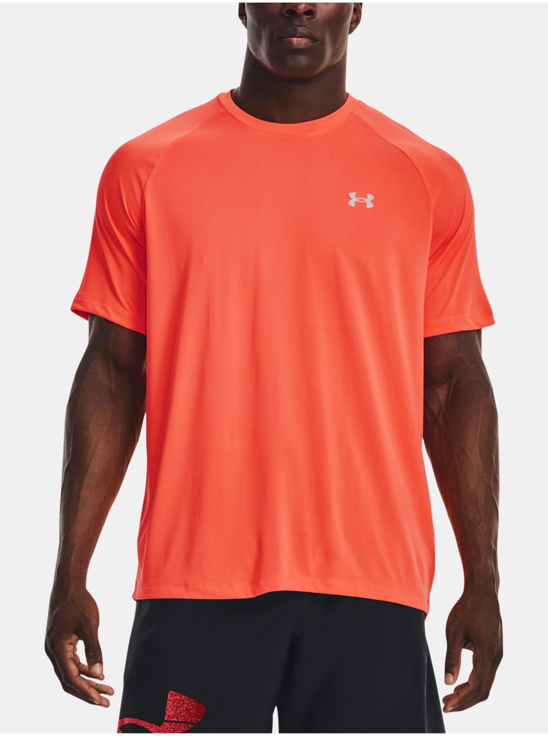 Levně Oranžové sportovní tričko Under Armour UA Tech Reflective SS