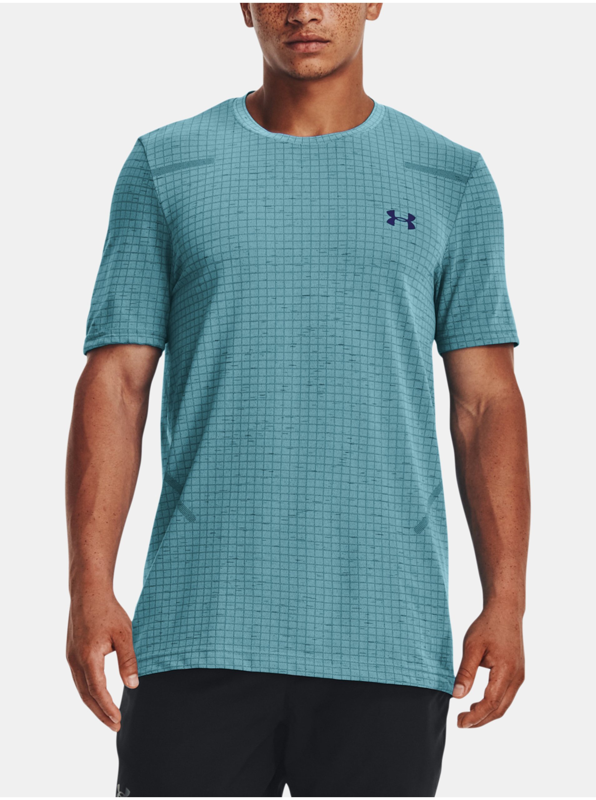 Levně Světle modré sportovní tričko Under Armour UA Seamless Grid SS