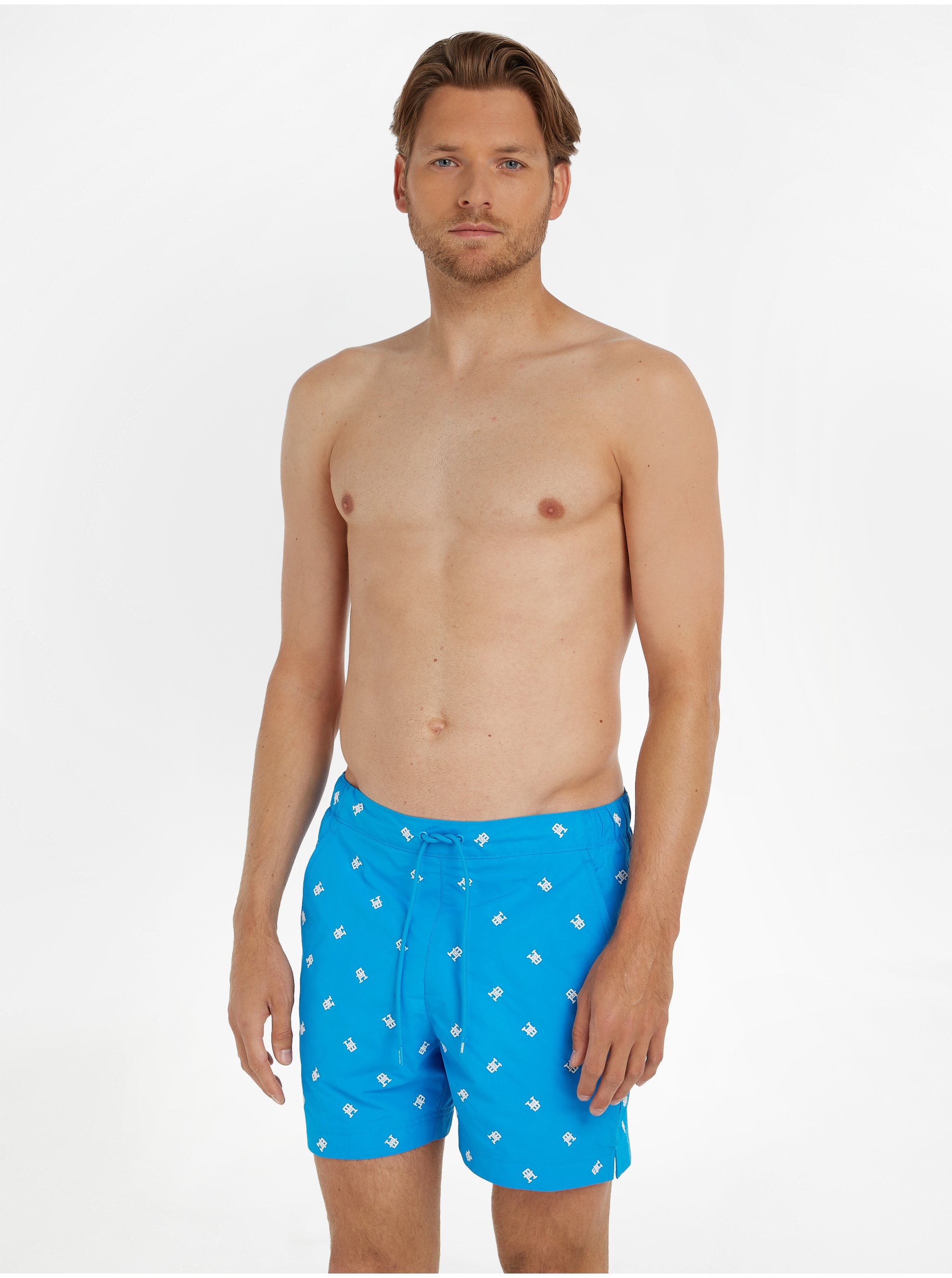 Levně Modré pánské vzorované plavky Tommy Hilfiger