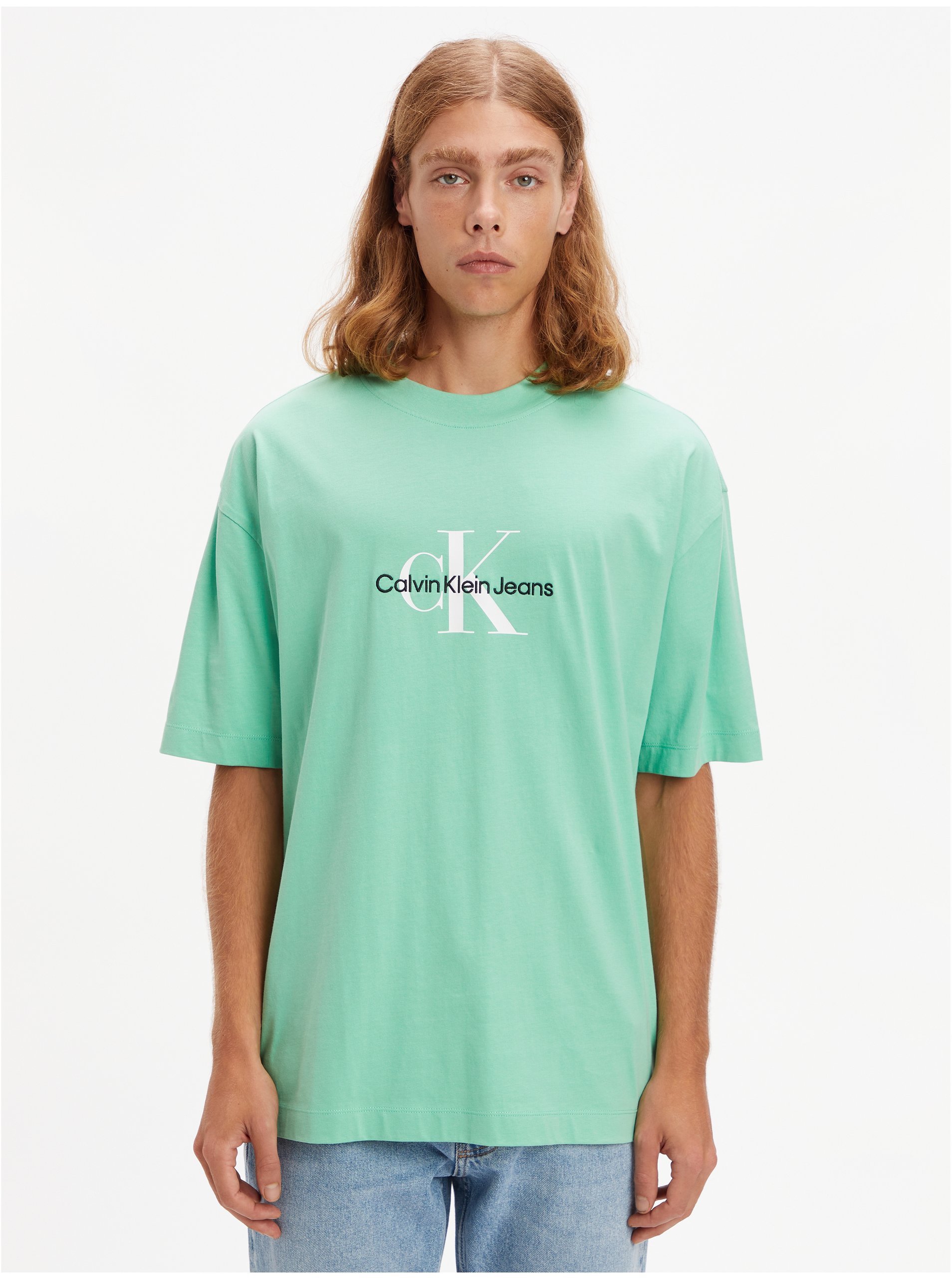 Levně Světle zelené pánské oversize tričko Calvin Klein Jeans