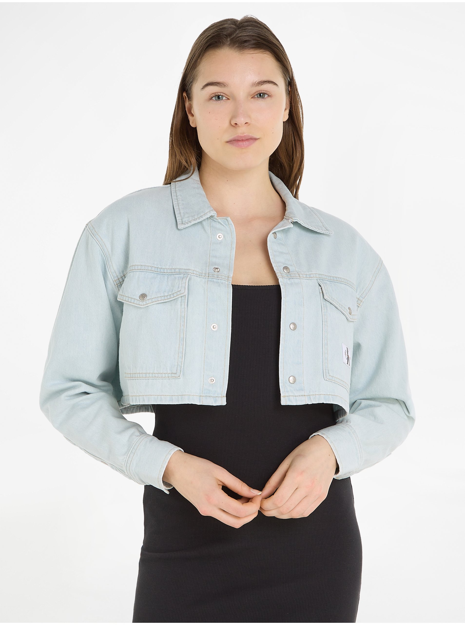 Levně Světle modrá dámská crop top džínová bunda Calvin Klein Jeans