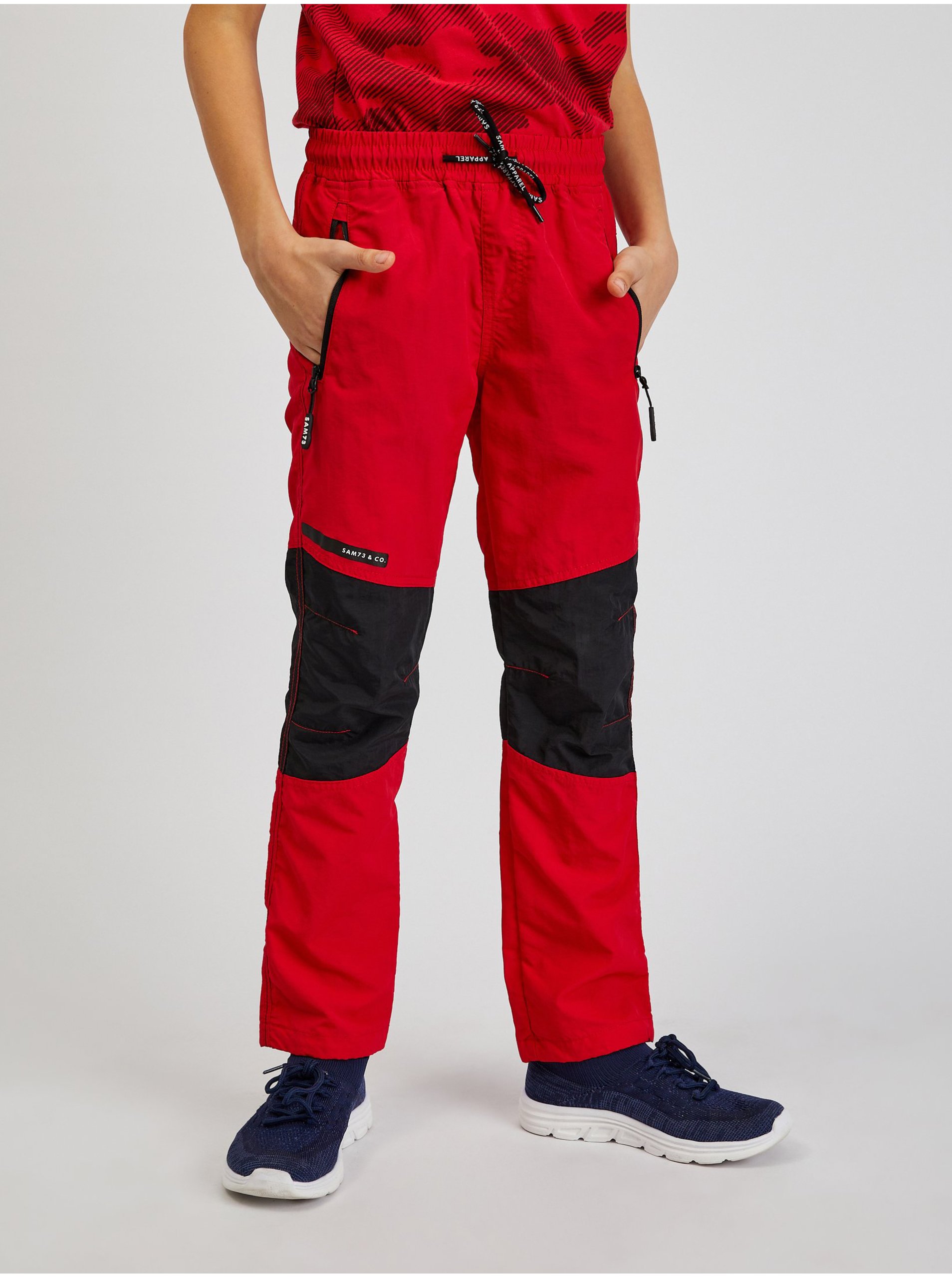 Levně Černo-červené dětské sportovní kalhoty SAM73 Jonathan