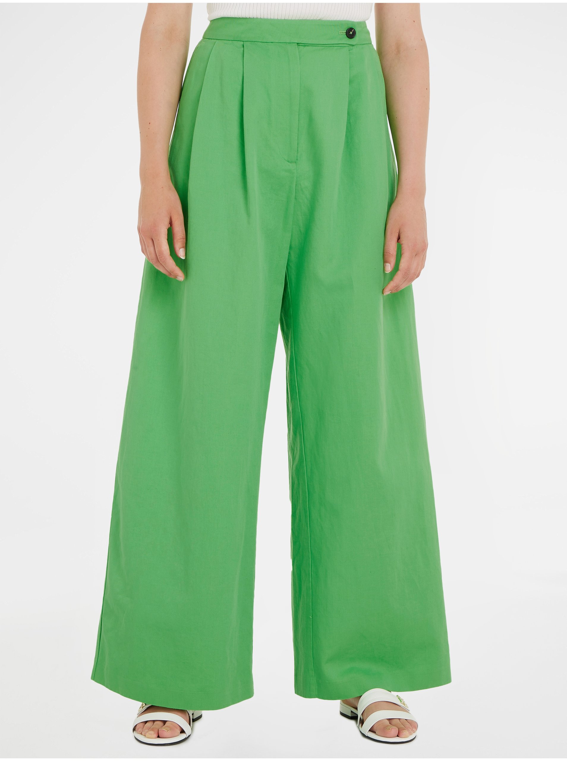 Levně Světle zelené dámské široké kalhoty s příměsí lnu Tommy Hilfiger