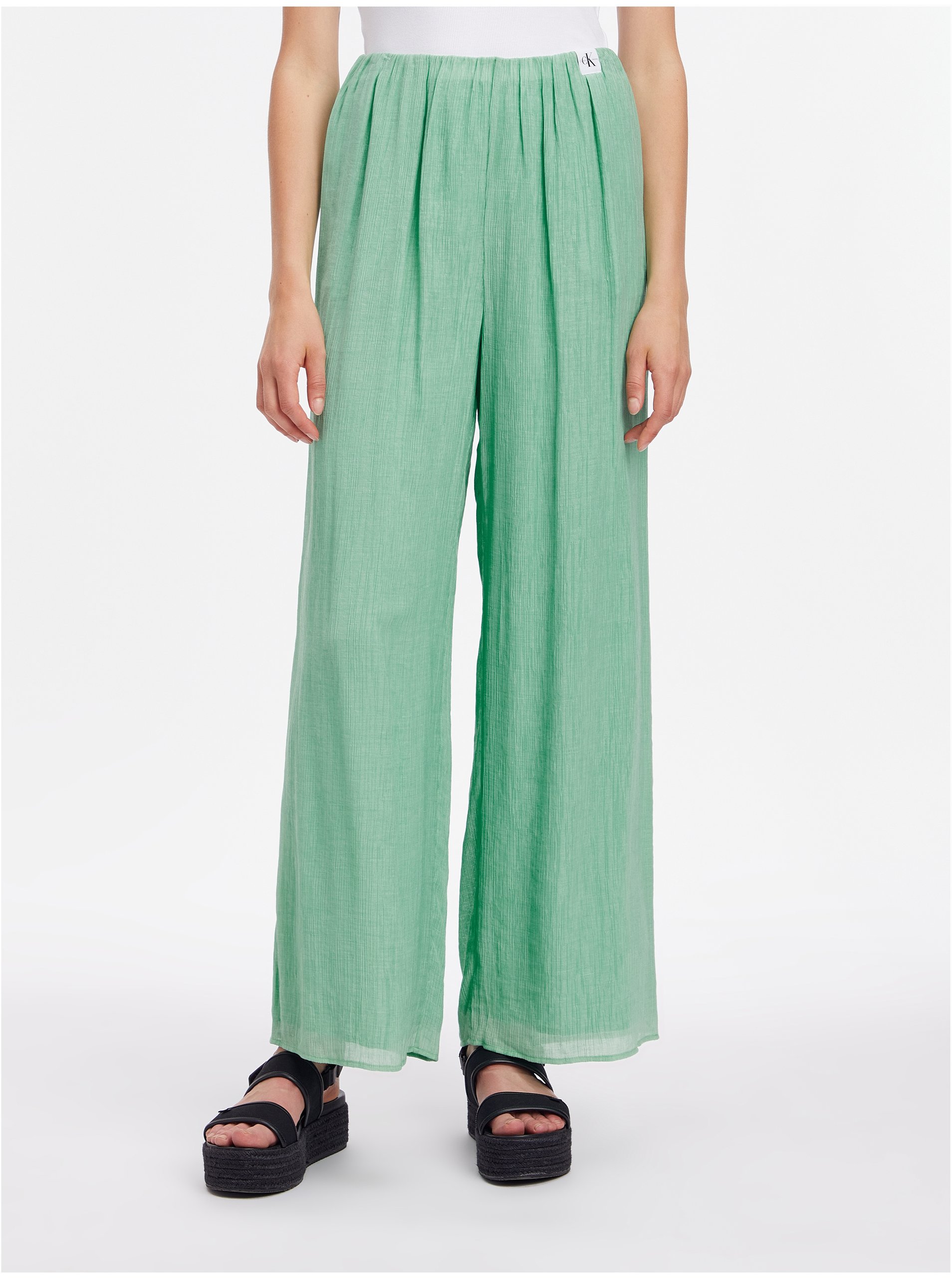 Lacno Neformálne nohavice pre ženy Calvin Klein Jeans - zelená