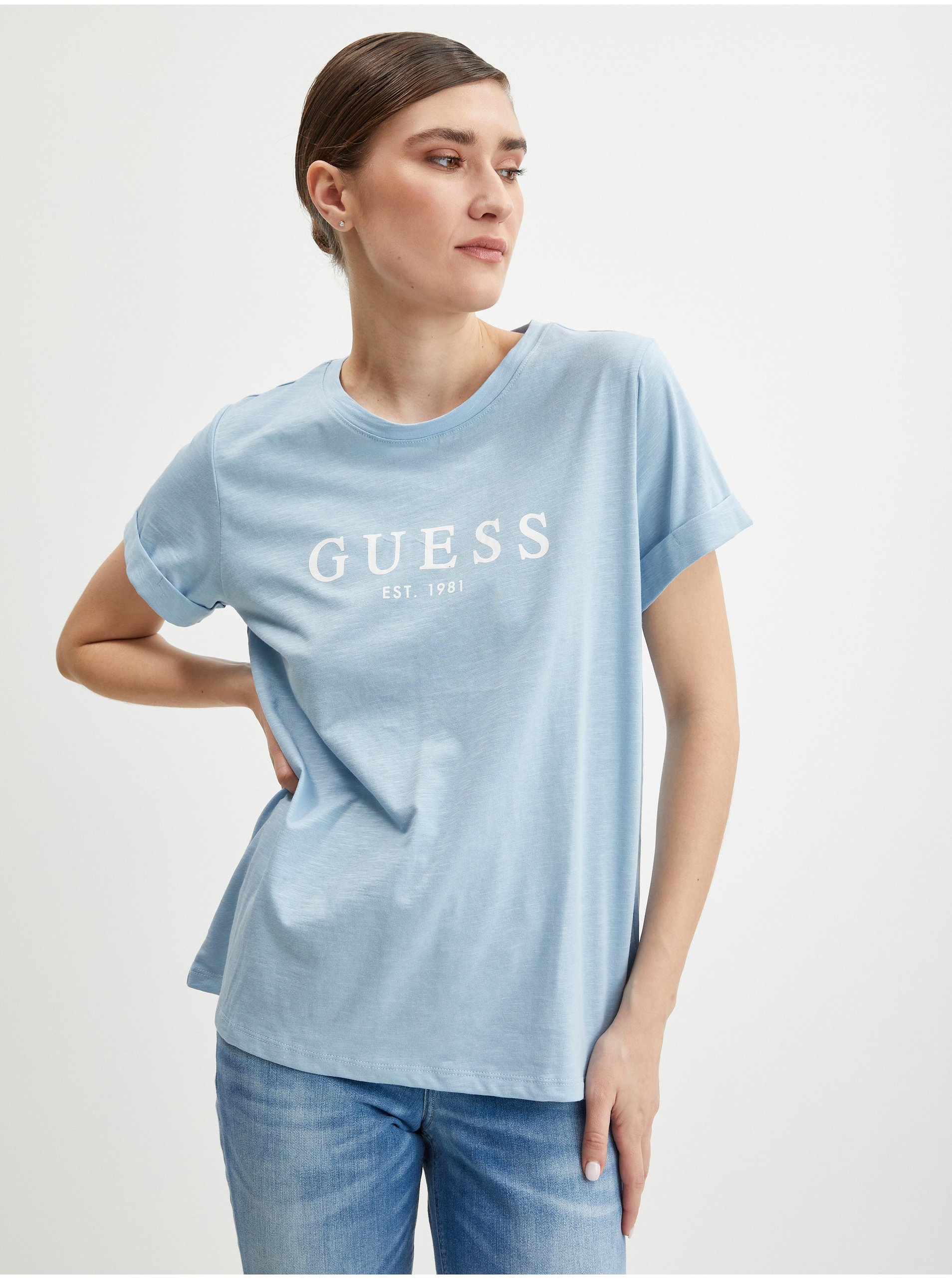 Levně Světle modré dámské tričko Guess 1981