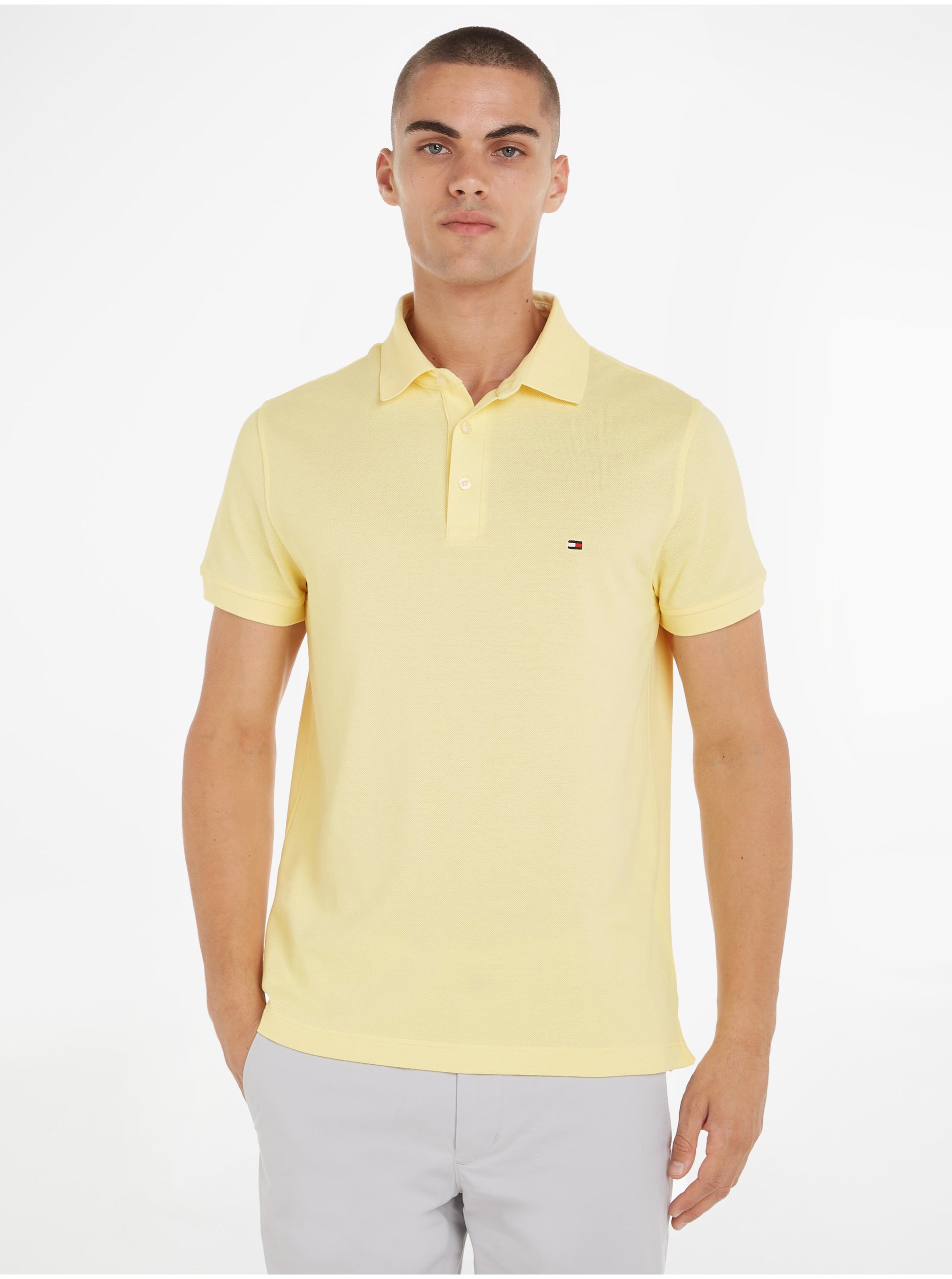 Levně Žluté pánské polo tričko Tommy Hilfiger