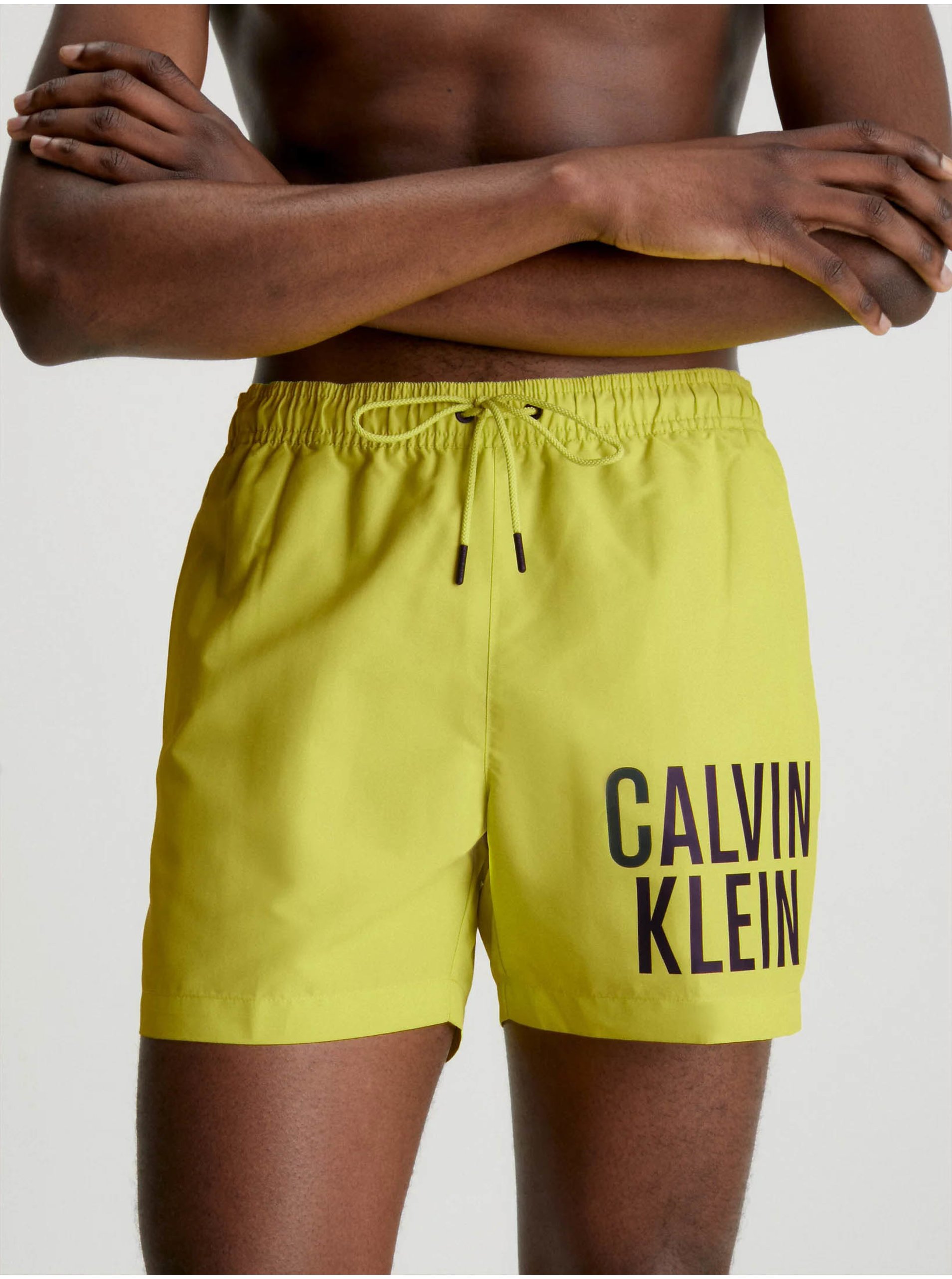 E-shop Žluté pánské plavky Calvin Klein Underwear Intense Power-Medium Drawstring