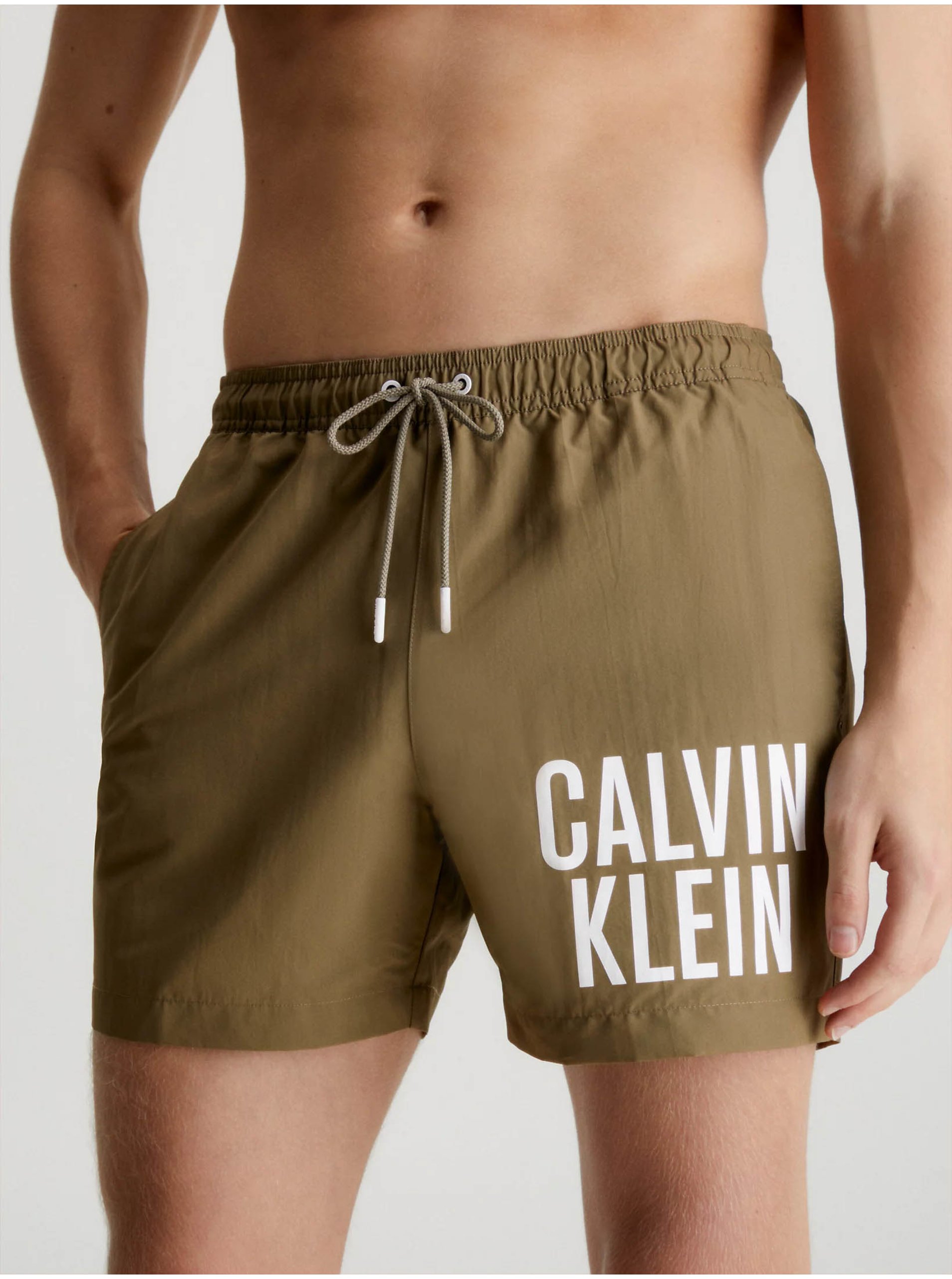 Levně Khaki pánské plavky Calvin Klein Underwear Intense Power-Medium Drawstring