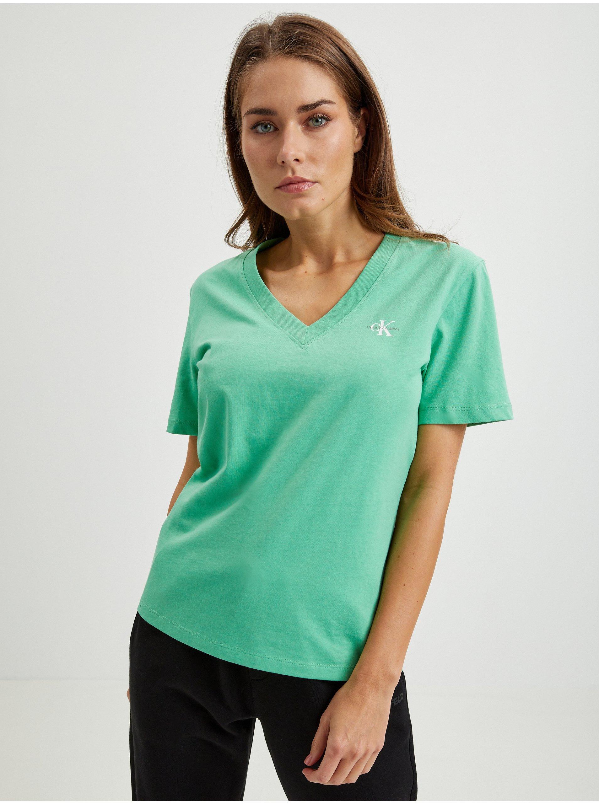 E-shop Světle zelené dámské tričko Calvin Klein Jeans