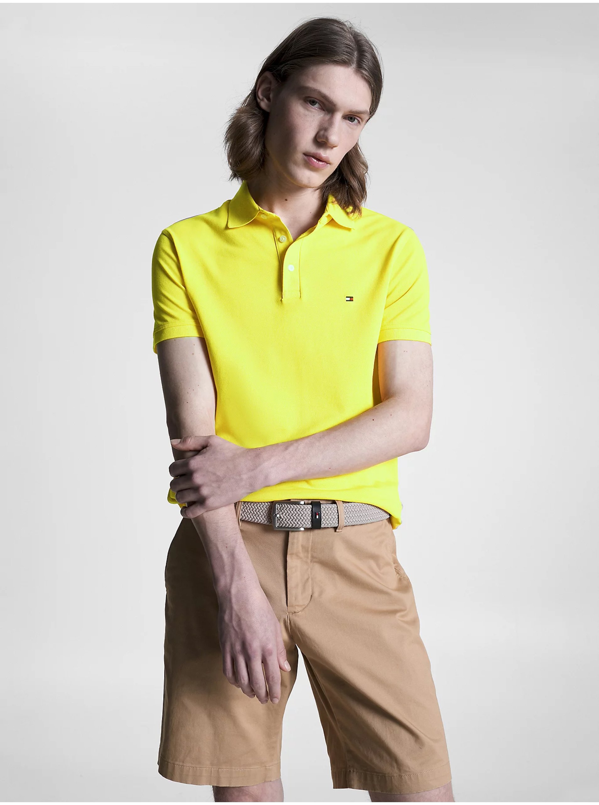 Levně Žluté pánské polo tričko Tommy Hilfiger 1985 Slim Polo