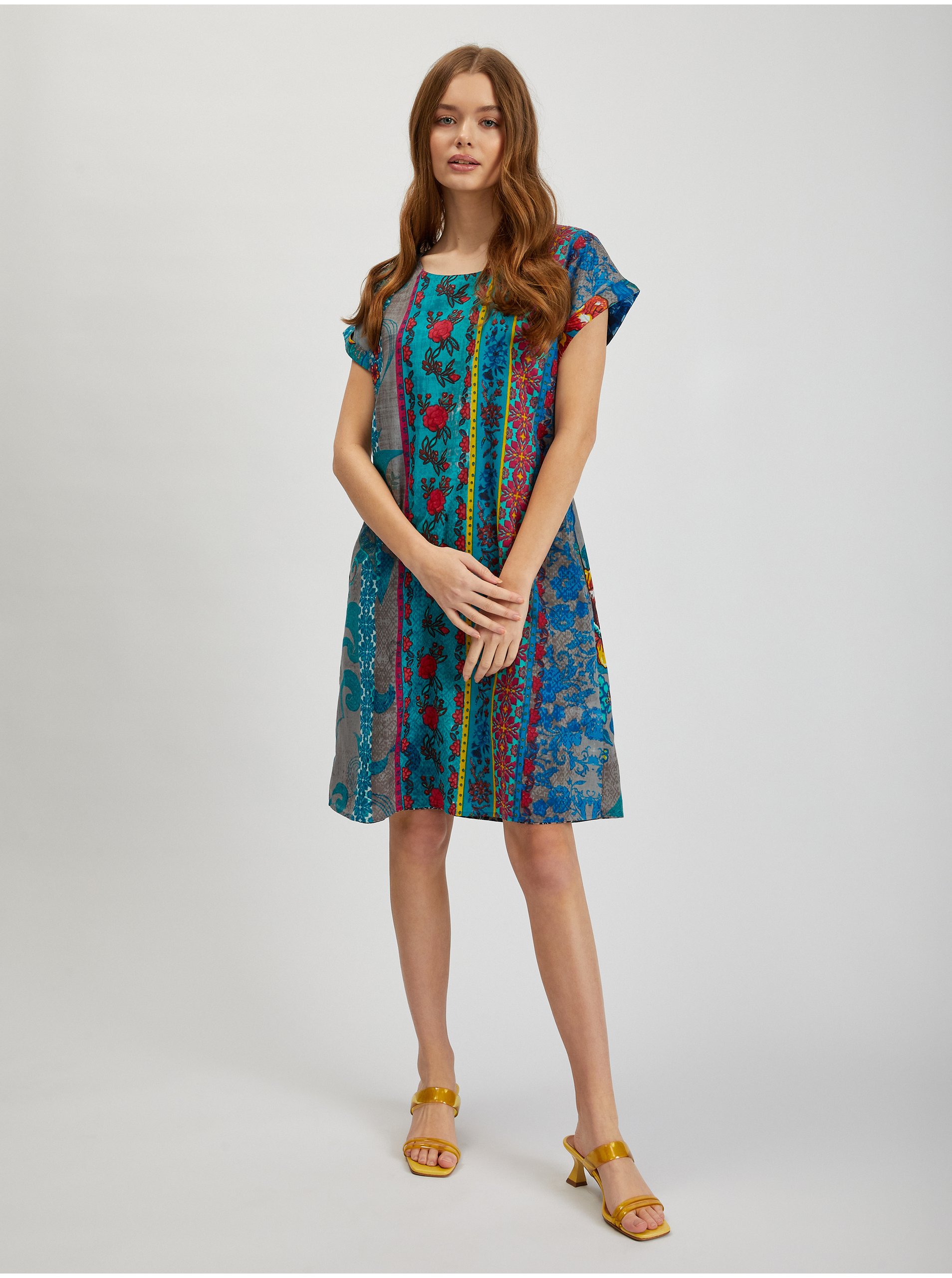 Levně Modro-petrolejové dámské vzorované šaty Orientique