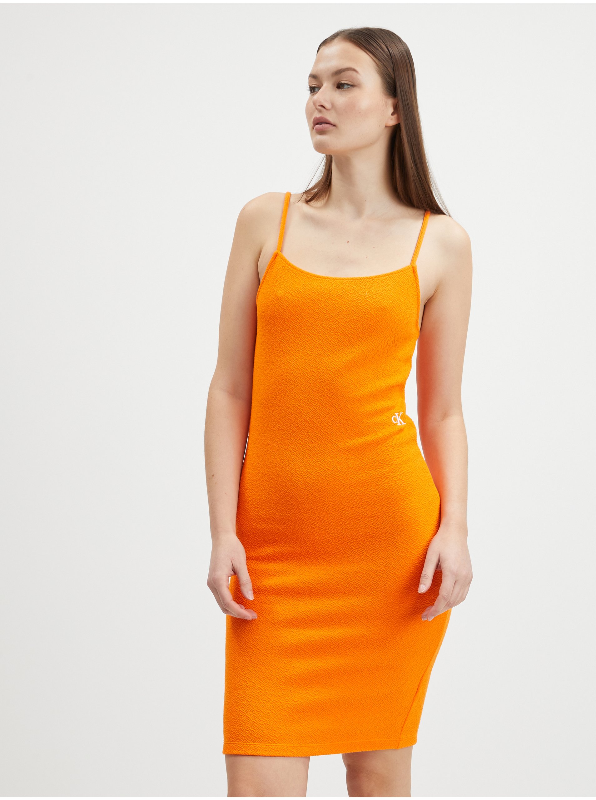 Levně Oranžové dámské pouzdrové šaty Calvin Klein Jeans