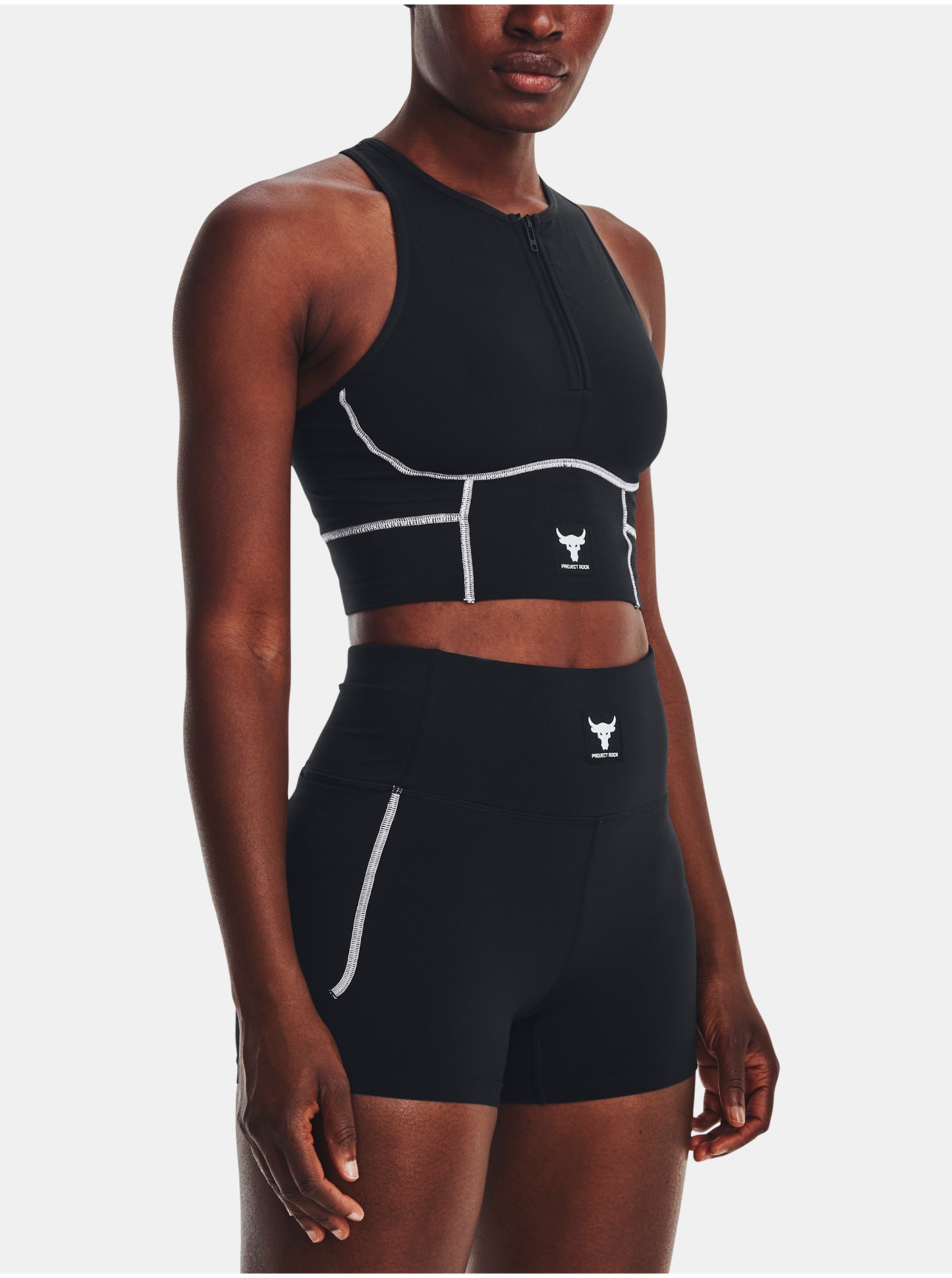 Levně Černý dámský sportovní crop top Under Armour Pjt Rck Meridian Zip Tank