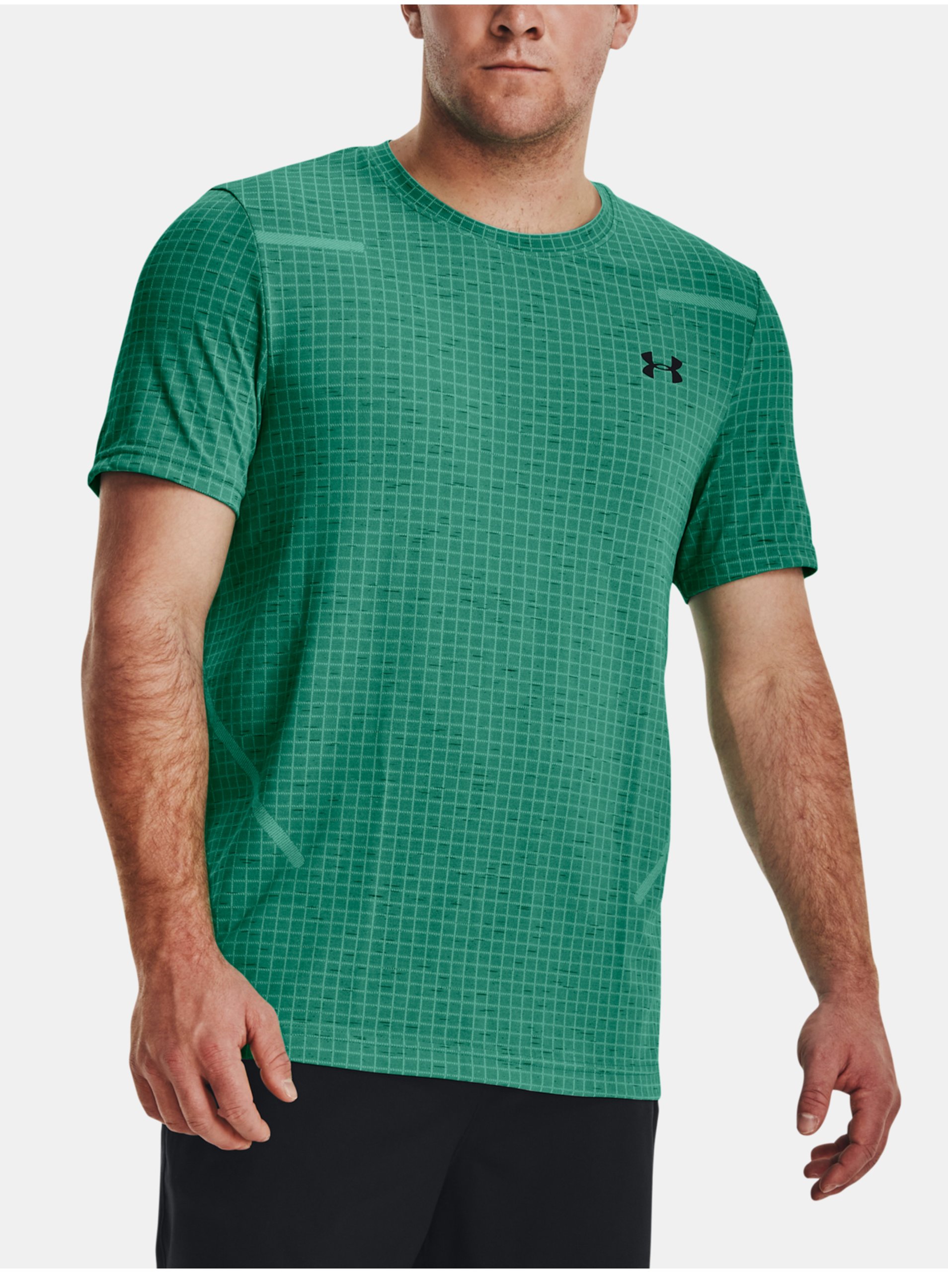 Levně Zelené sportovní tričko Under Armour UA Seamless Grid