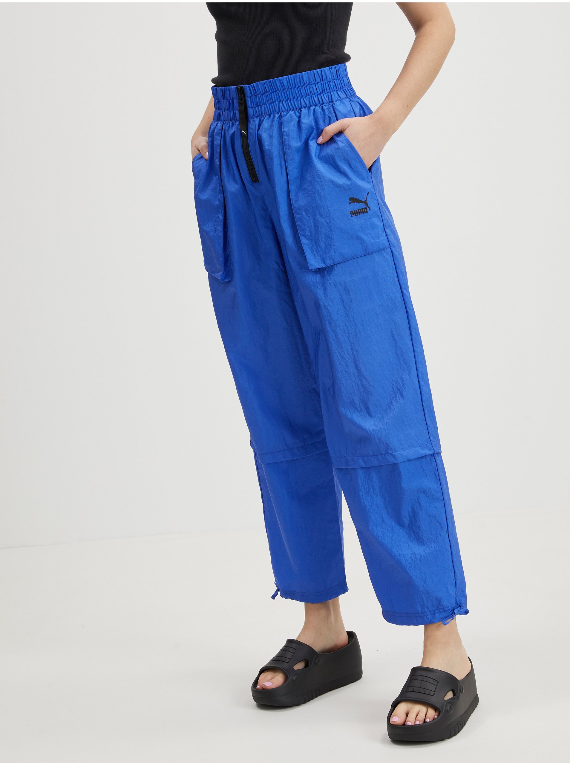 E-shop Modré dámské šusťákové kalhoty Puma Dare To