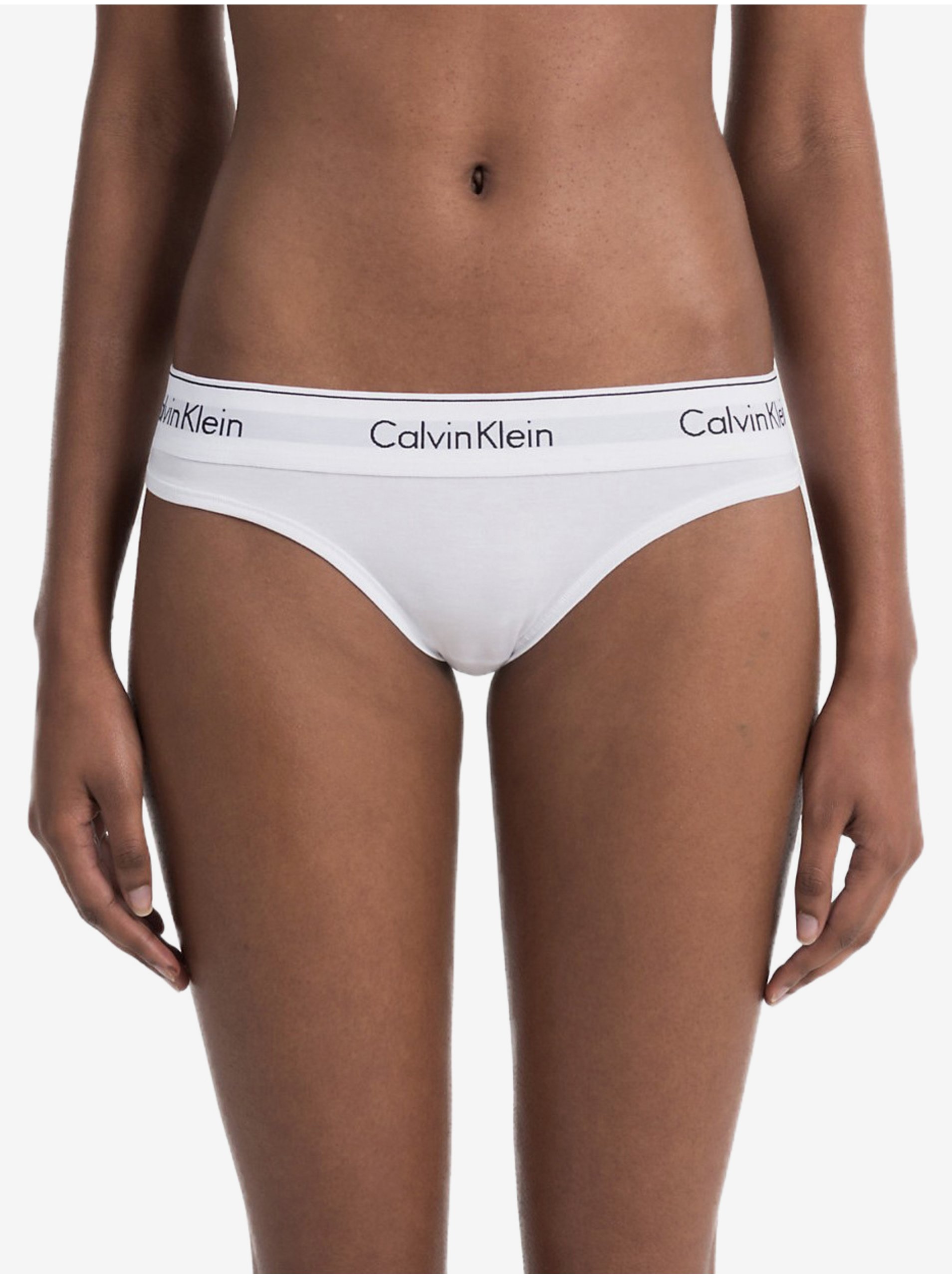 Levně Bílá dámská tanga Thong Strings Calvin Klein Underwear