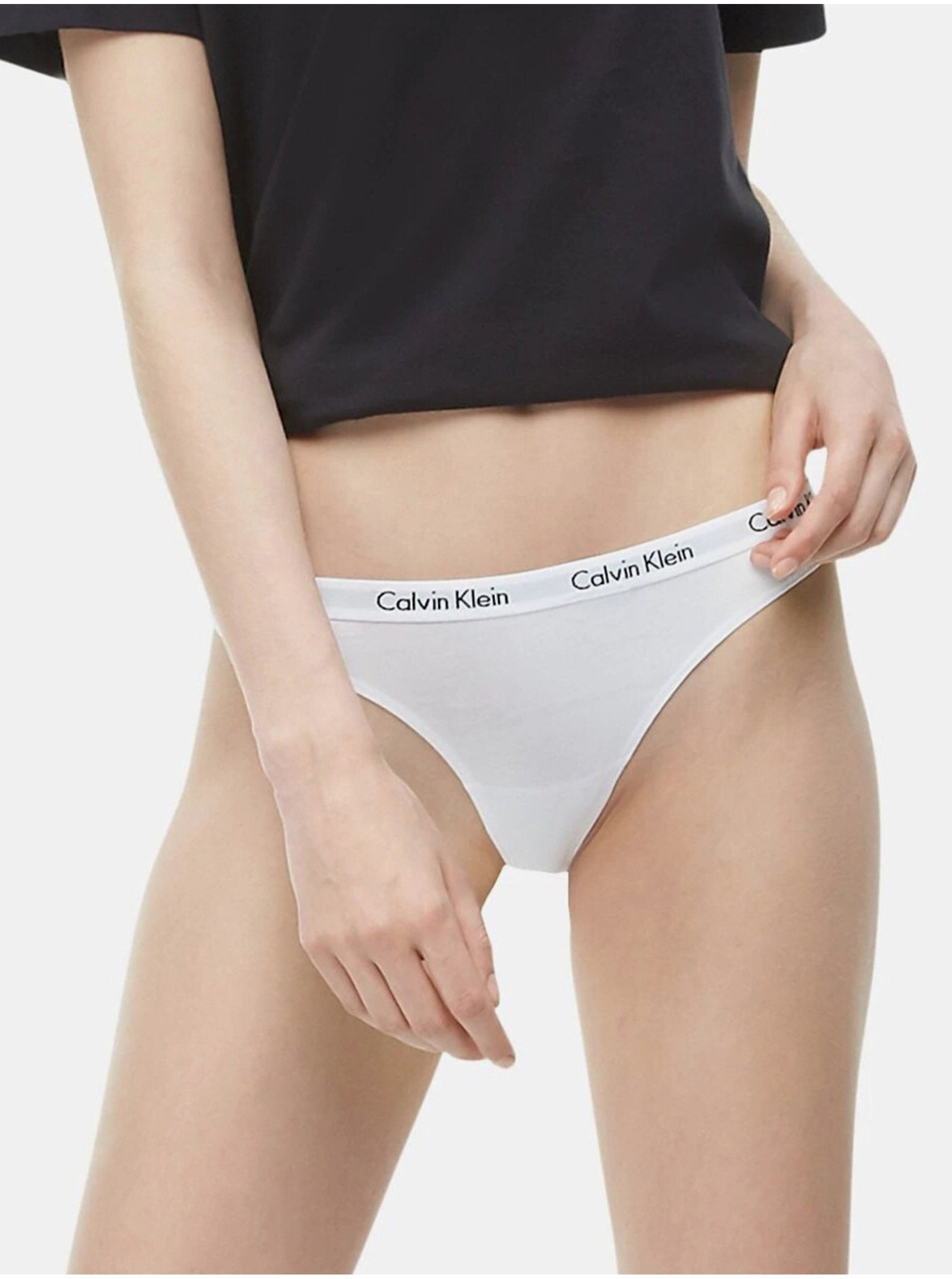 Levně Bílá tanga s bílou gumou Thong Strings Calvin Klein Underwear
