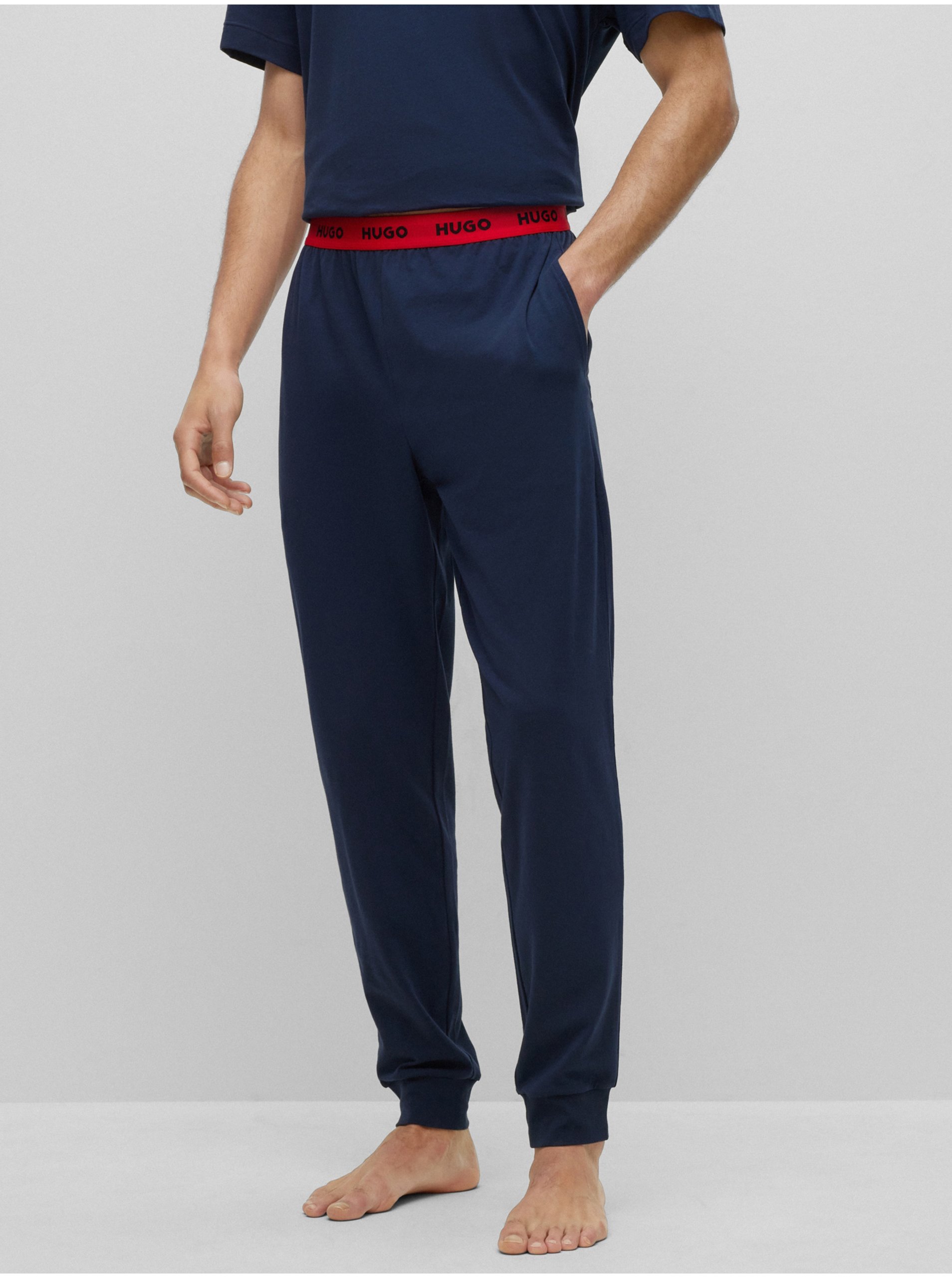 Levně Tmavě modré pánské pyžamové kalhoty HUGO