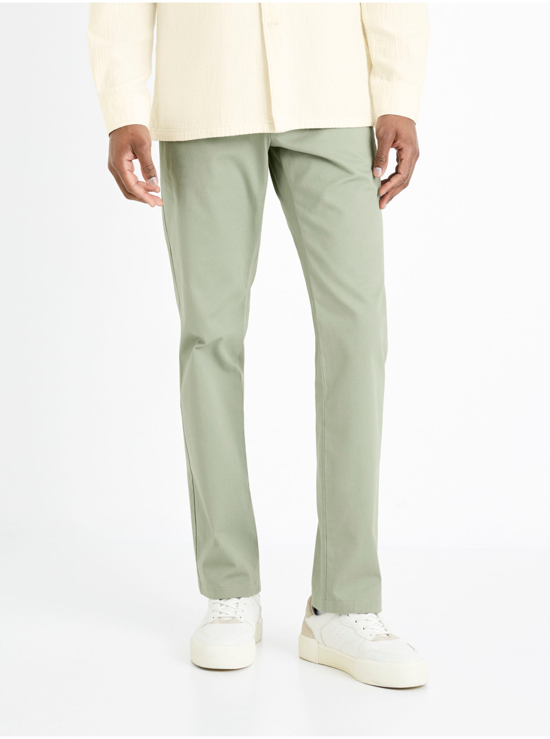 Levně Světle zelené pánské kalhoty Celio Tohenri